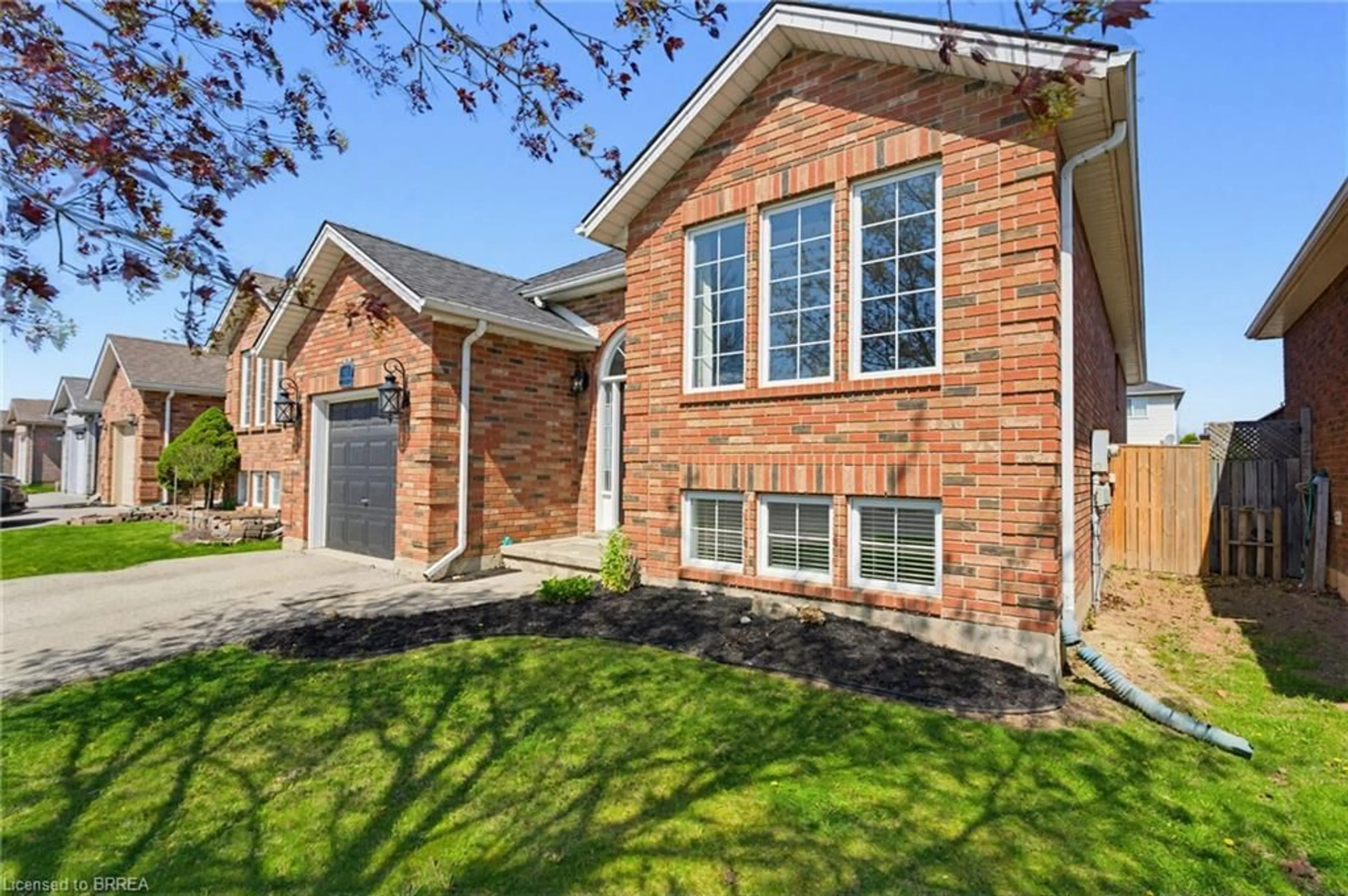 Home with brick exterior material, street for 60 St. Patrick's Dr, Brantford Ontario N3T 6L4