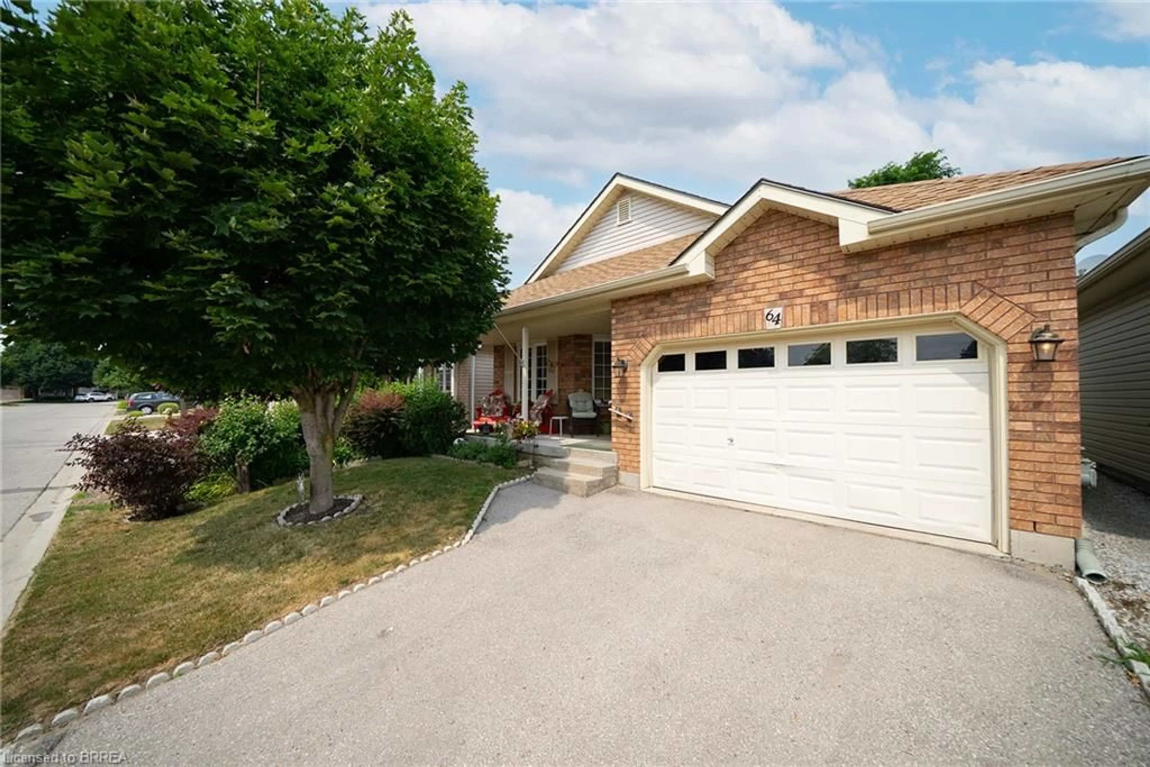 Home with brick exterior material, street for 64 Balsam Trail, Port Rowan Ontario N0E 1M0