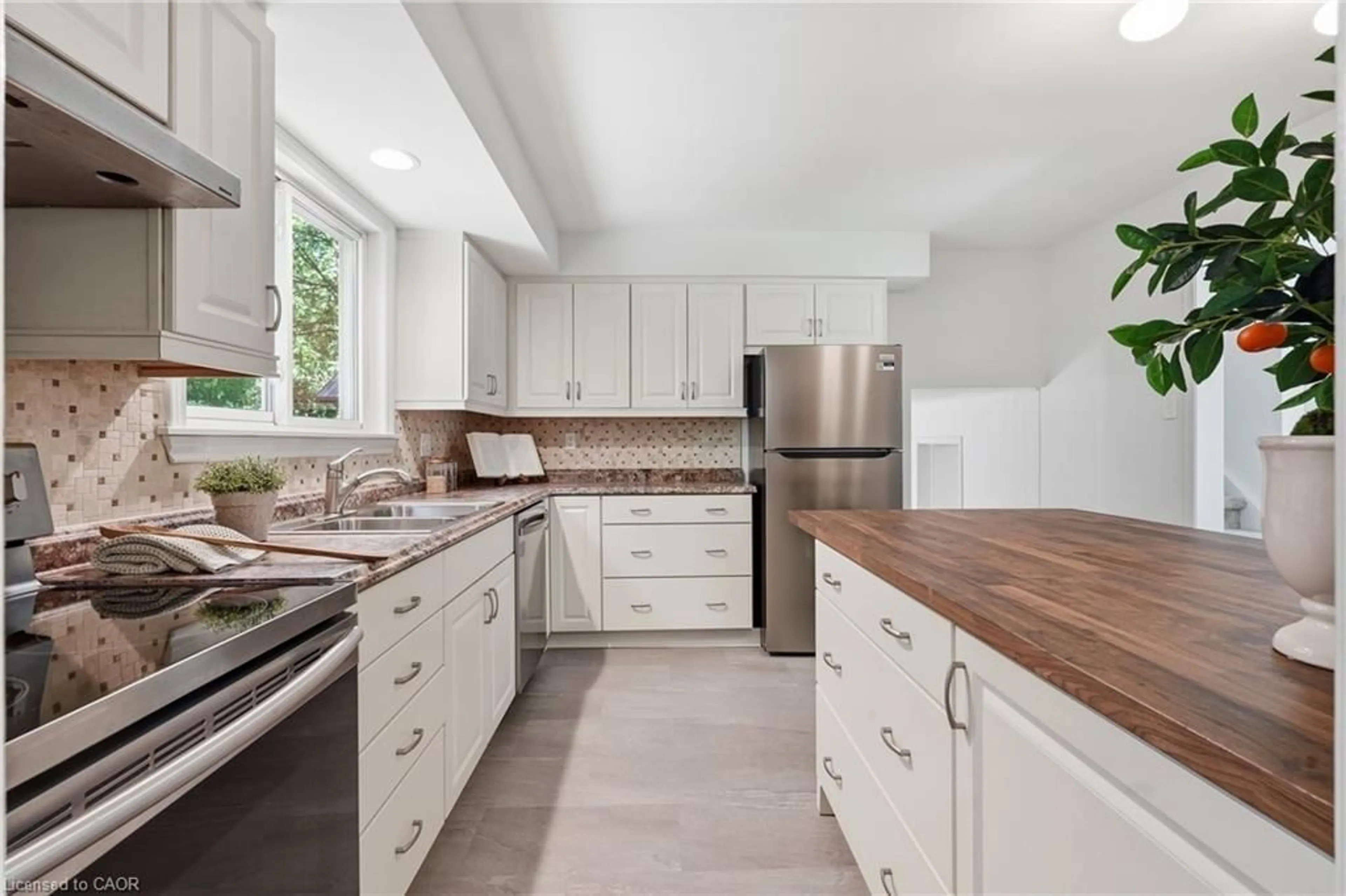 Open concept kitchen, ceramic/tile floor for 356 Coleridge Pl, Waterloo Ontario N2L 2V8