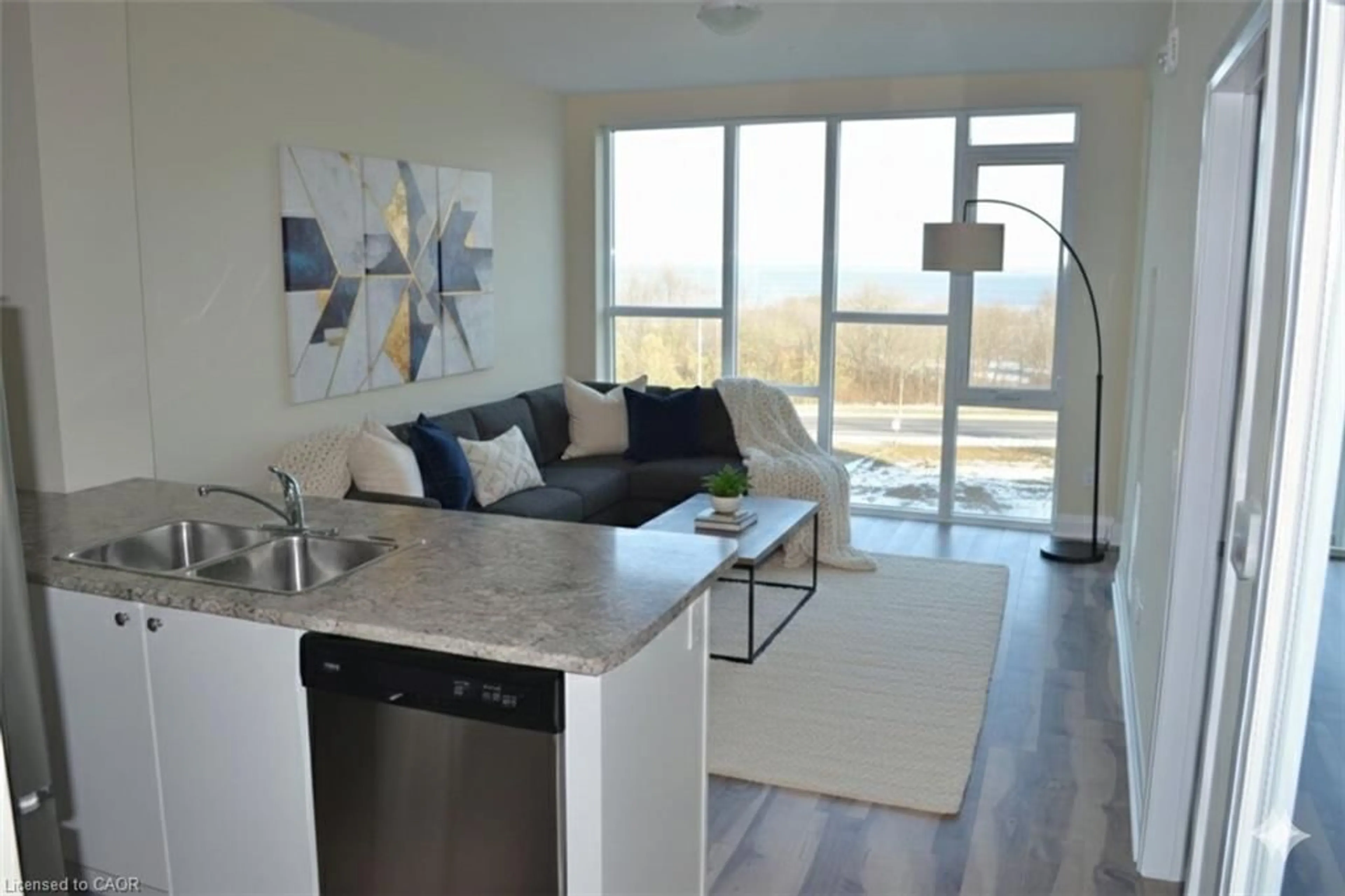 Living room with furniture, unknown for 16 Concord Pl #516, Grimsby Ontario L3M 0J1