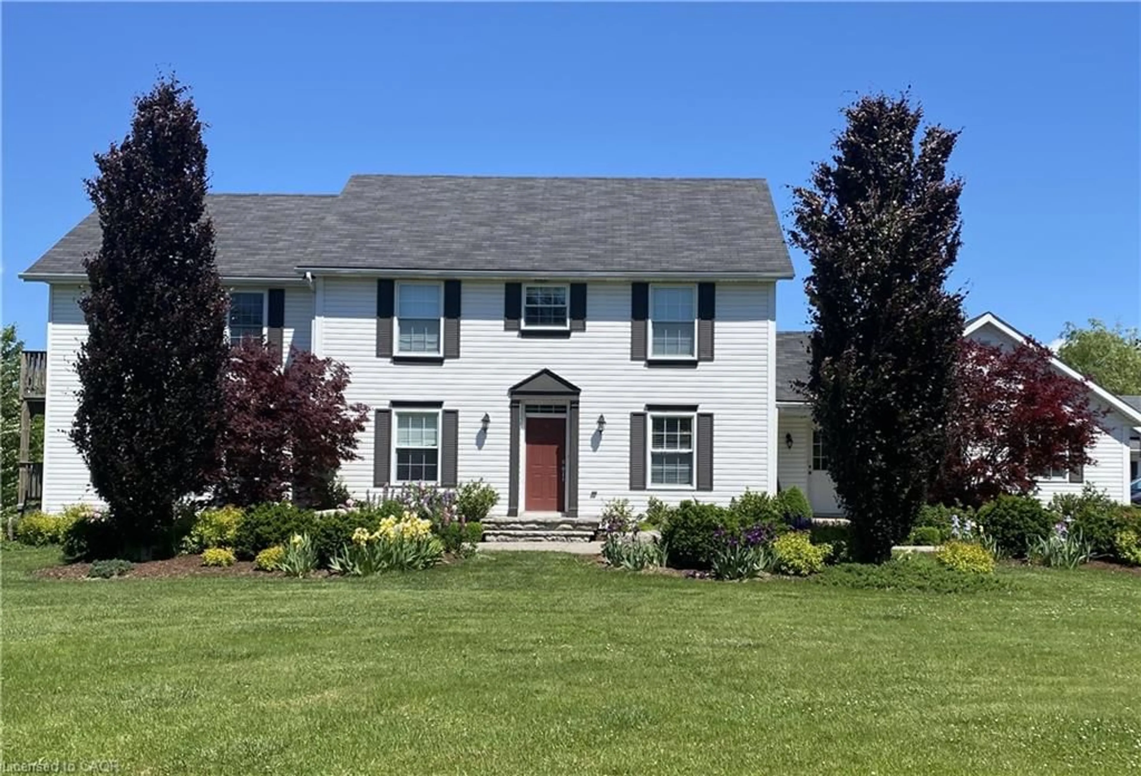 Home with vinyl exterior material, street for 20 Haldimand Trail, Dunnville Ontario N1A 1W9