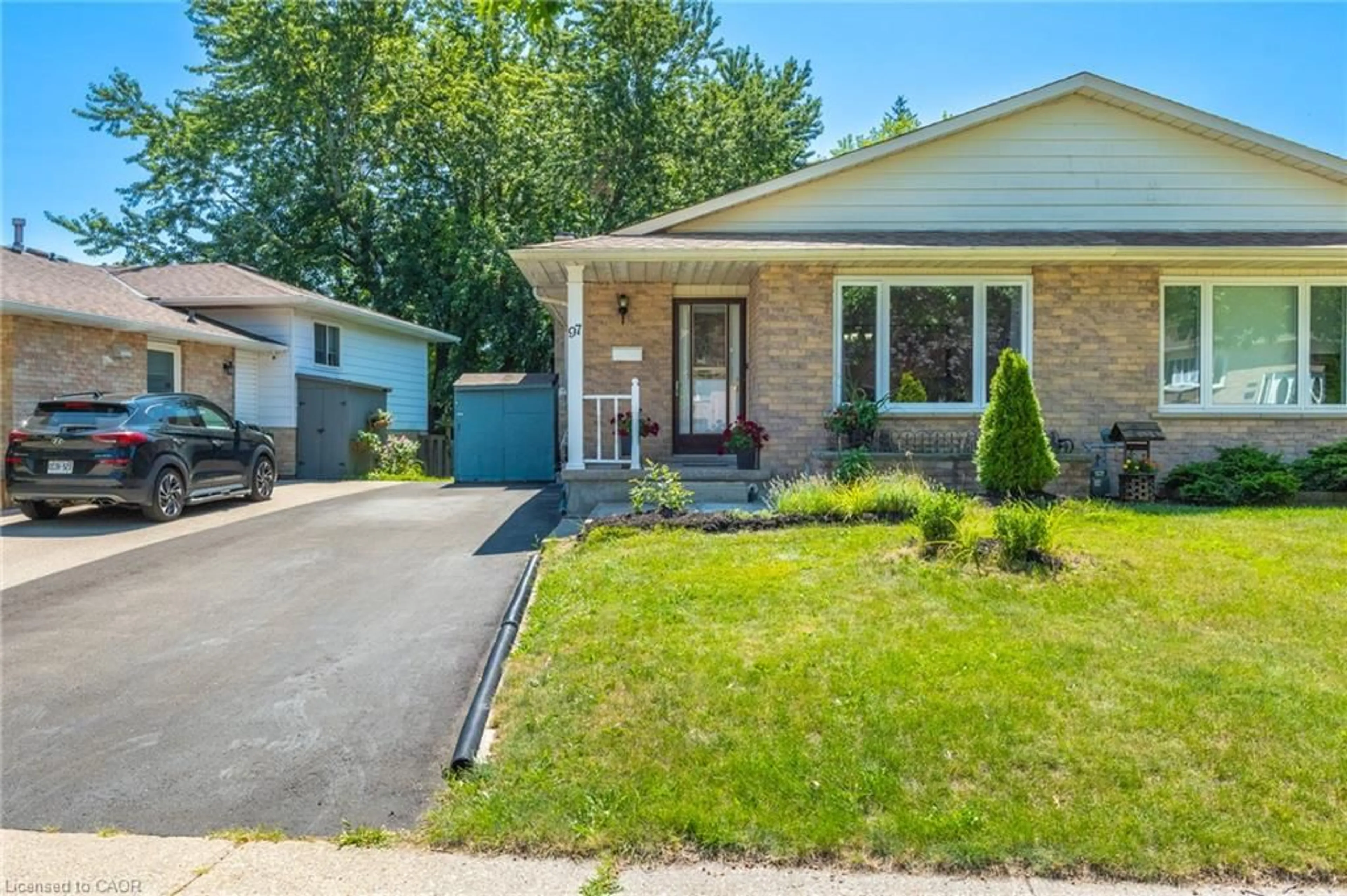 Home with brick exterior material, street for 97 Uxbridge Cres, Kitchener Ontario N2E 2S2