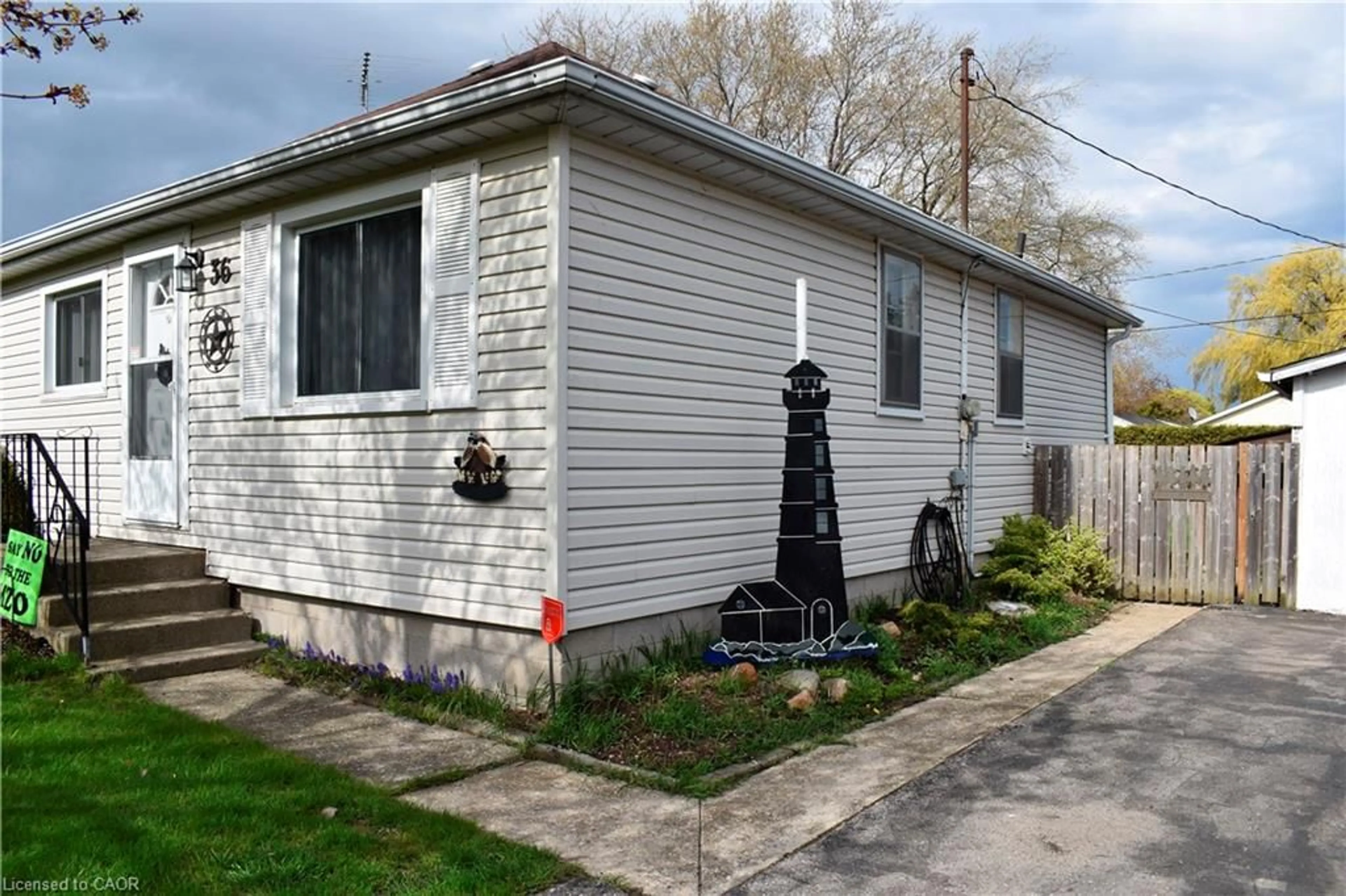 Home with vinyl exterior material, street for 36 Woodhouse Ave, Port Dover Ontario N0A 1N8