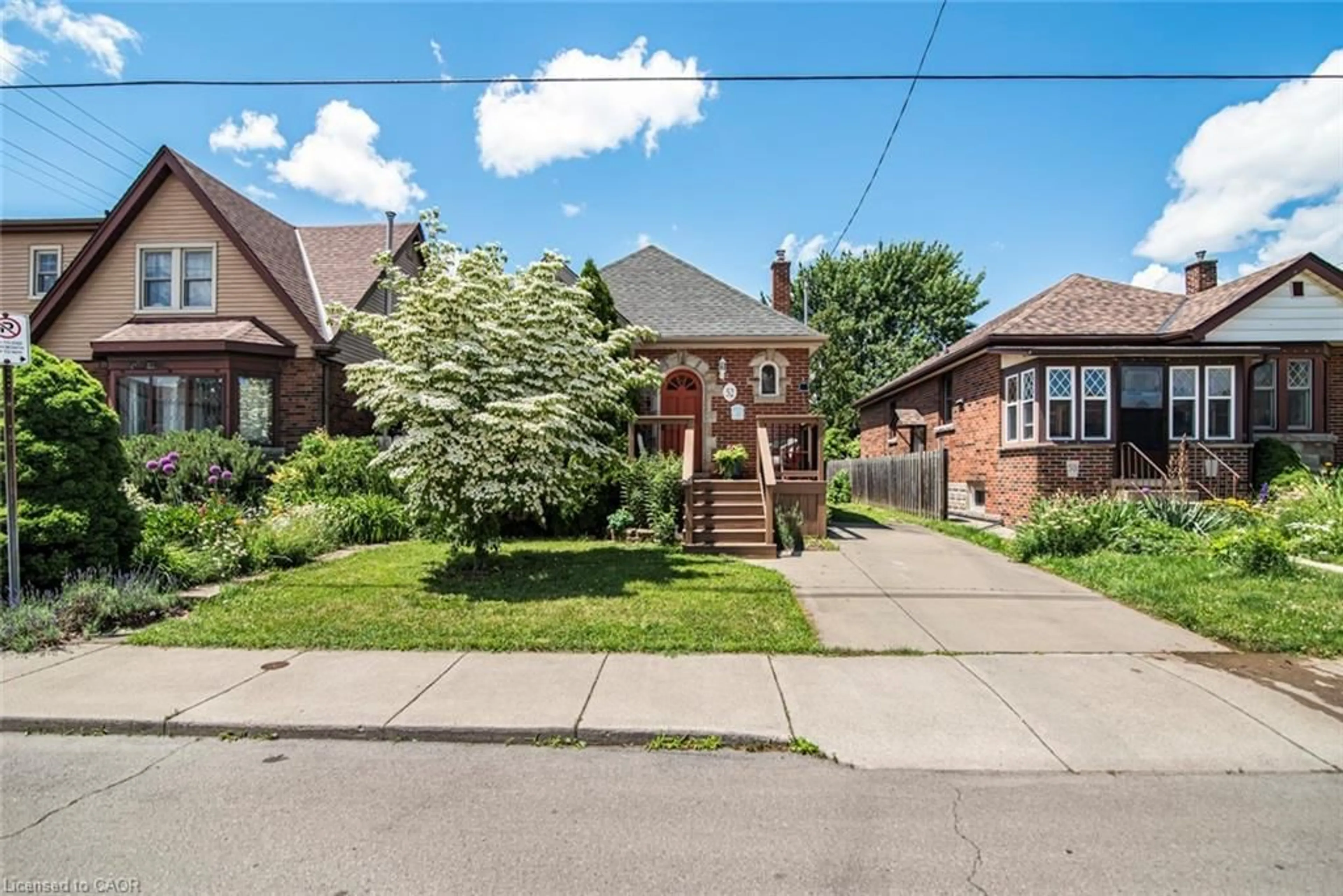 Home with brick exterior material, street for 52 Cameron Ave, Hamilton Ontario L8K 2W9