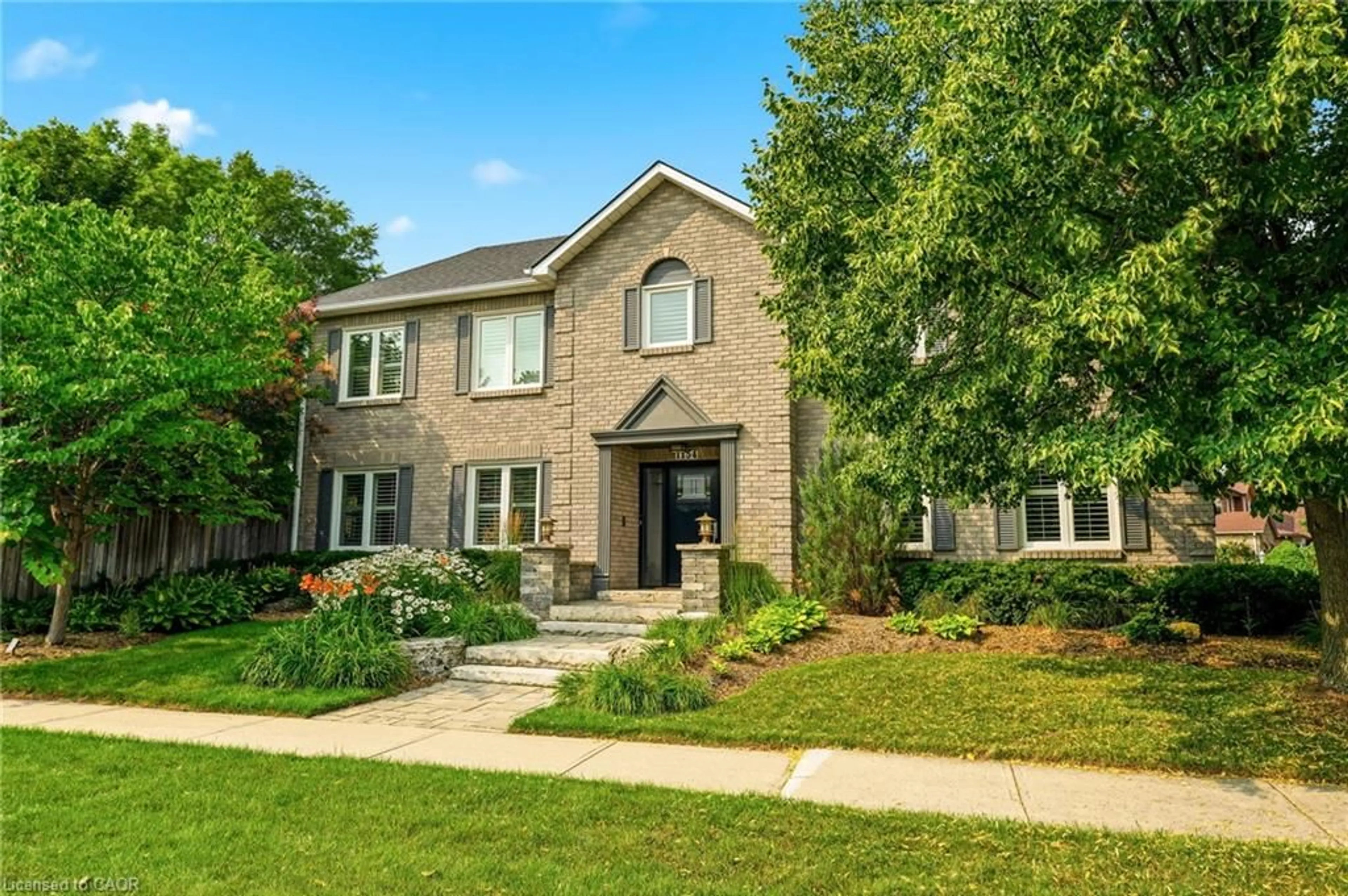 Home with brick exterior material, street for 1154 Windrush Dr, Oakville Ontario L6M 1T8