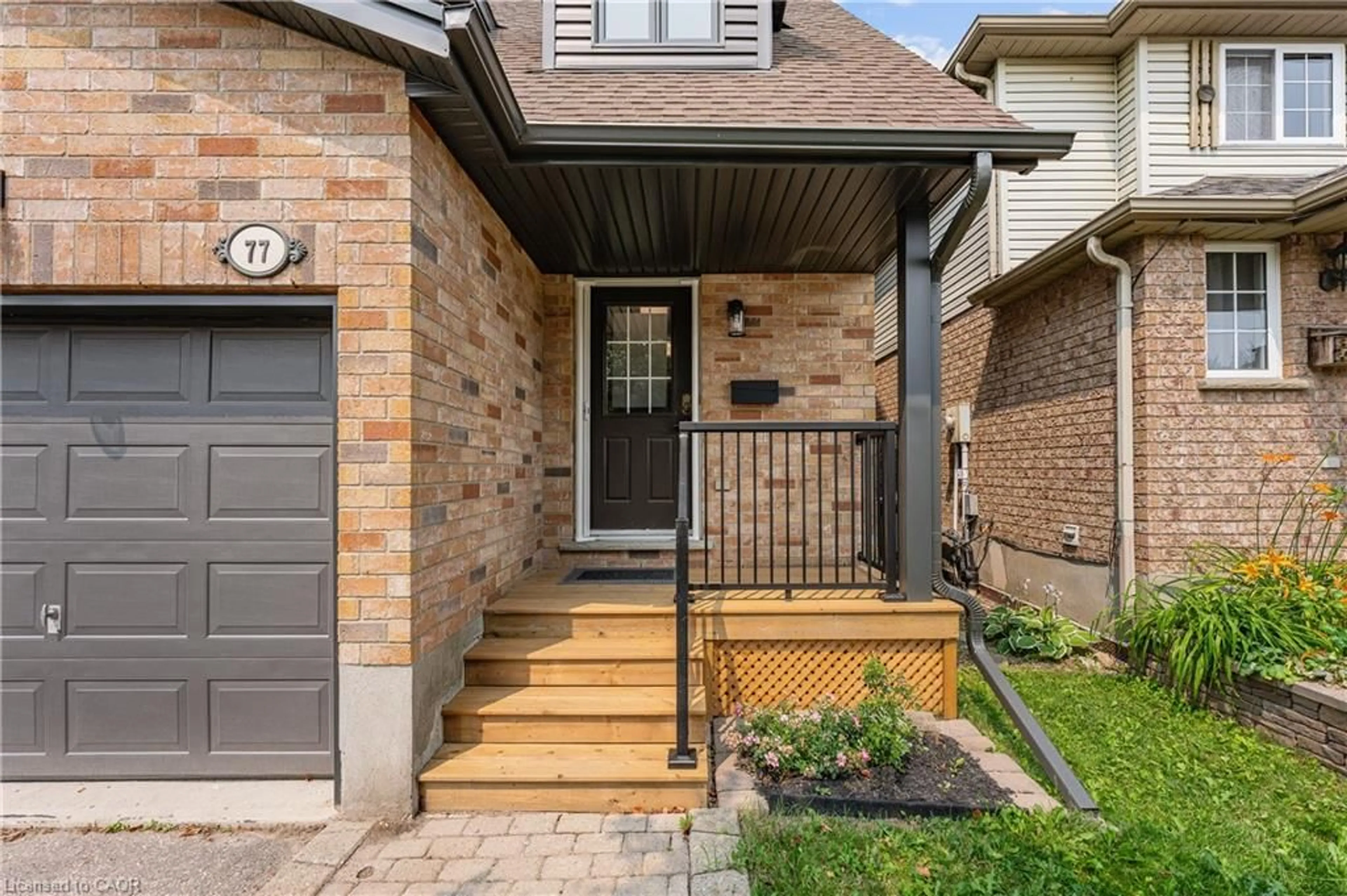 Home with brick exterior material, street for 77 Activa Ave, Kitchener Ontario N2E 3R4