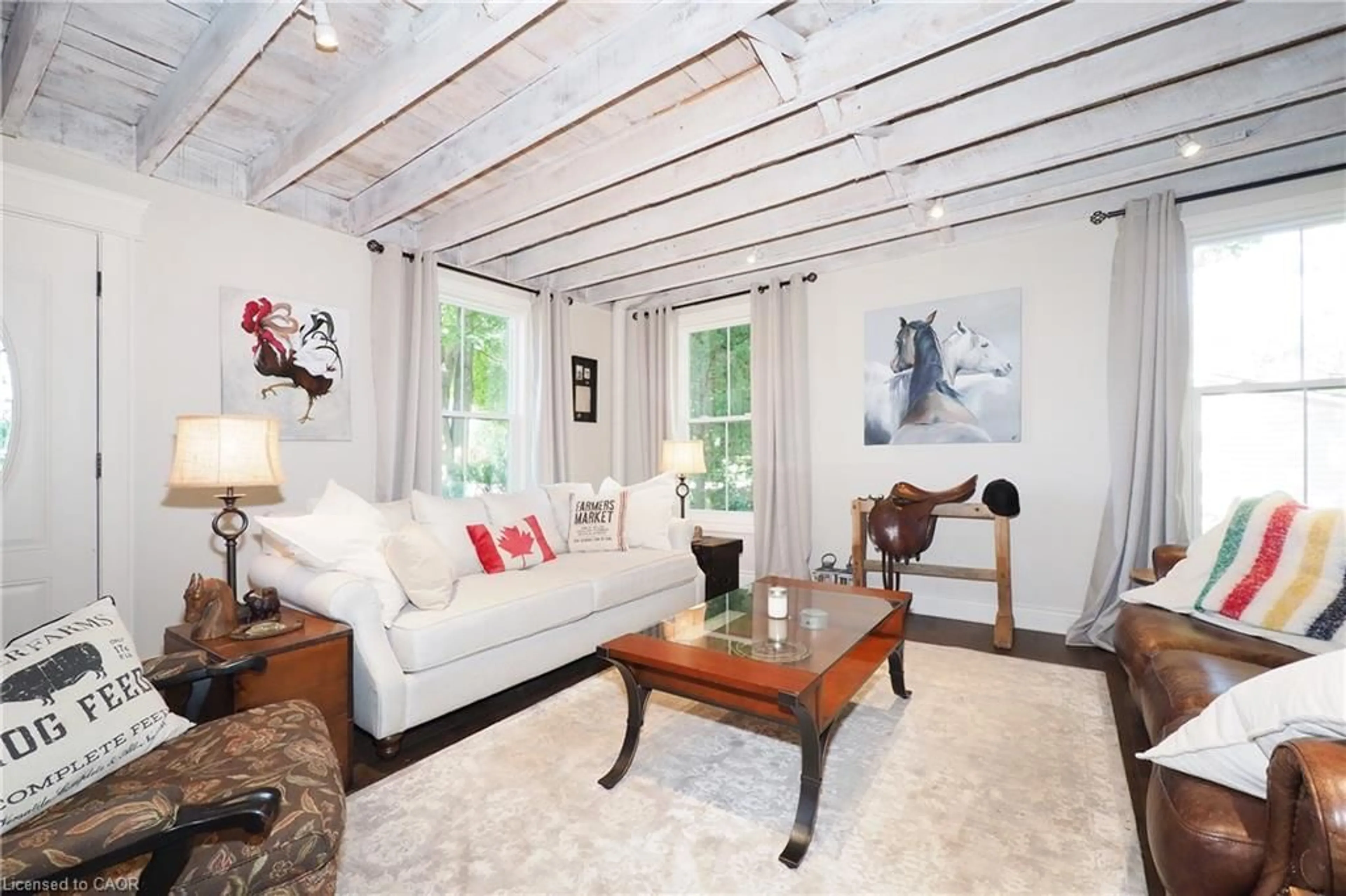 Living room with furniture, wood/laminate floor for 97 Hwy 2, Princeton Ontario N0J 1V0