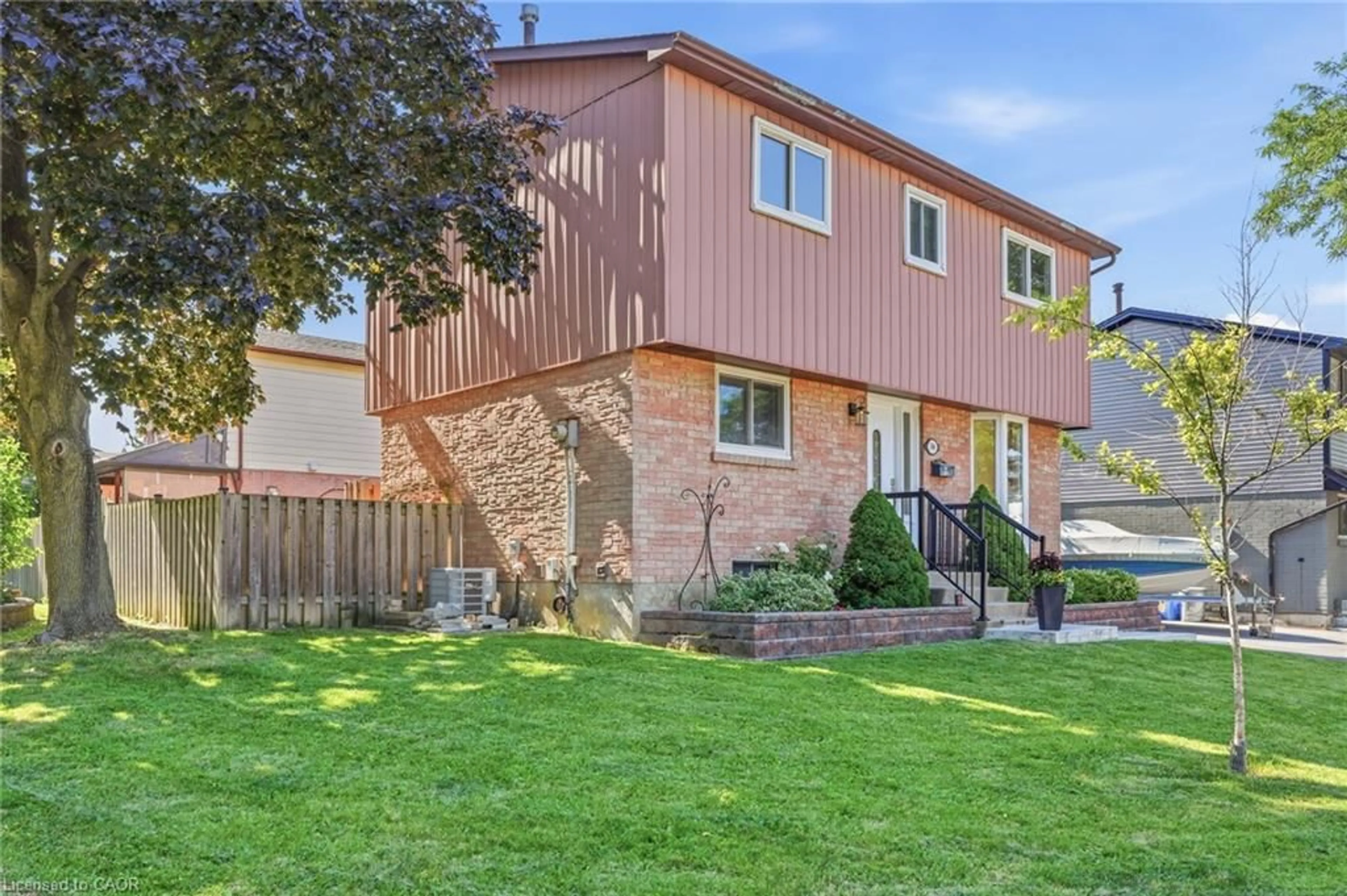 Home with brick exterior material, street for 14 Berrisfield Cres, Hamilton Ontario L4T 4X1