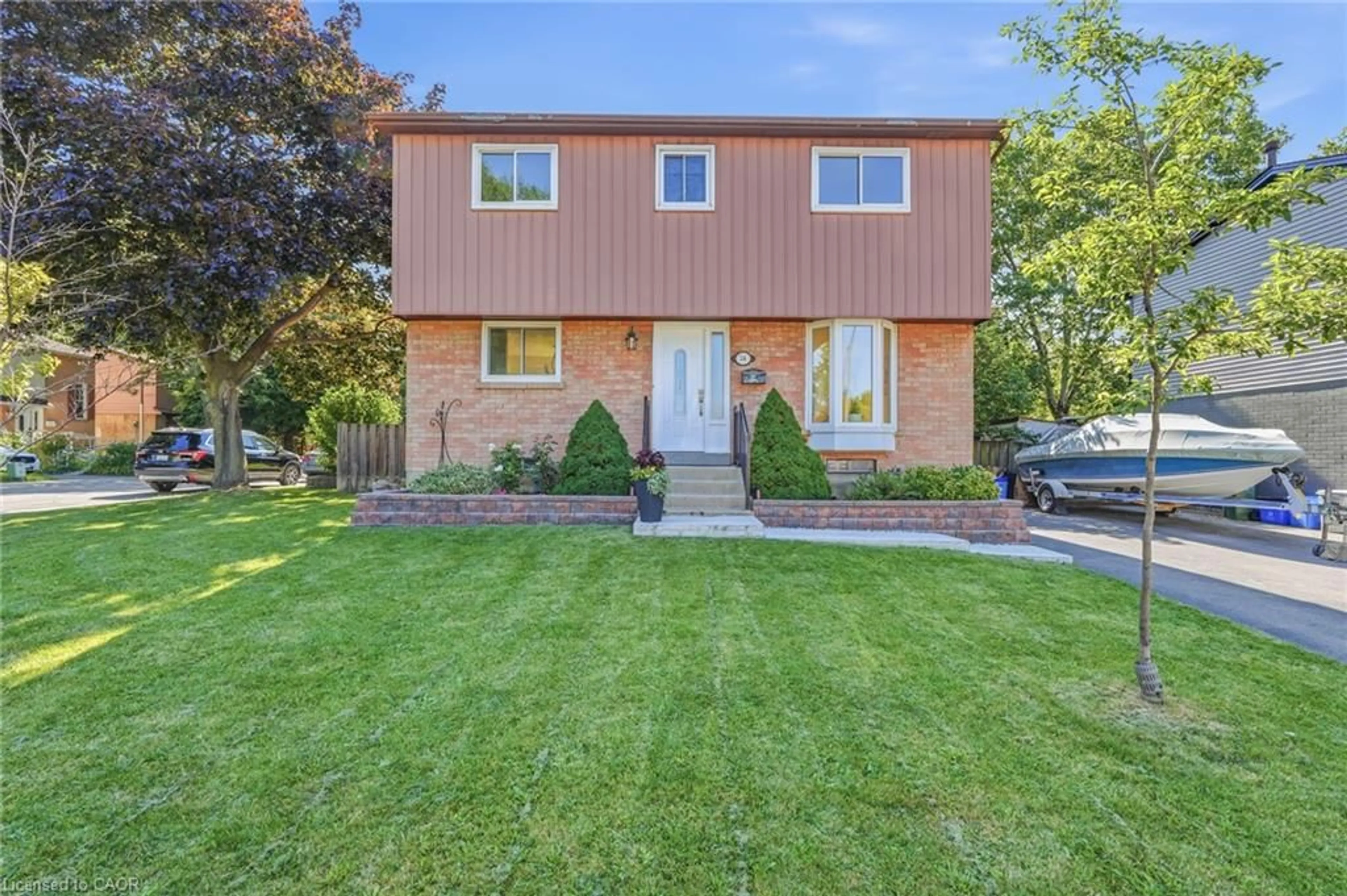 Home with brick exterior material, street for 14 Berrisfield Cres, Hamilton Ontario L4T 4X1
