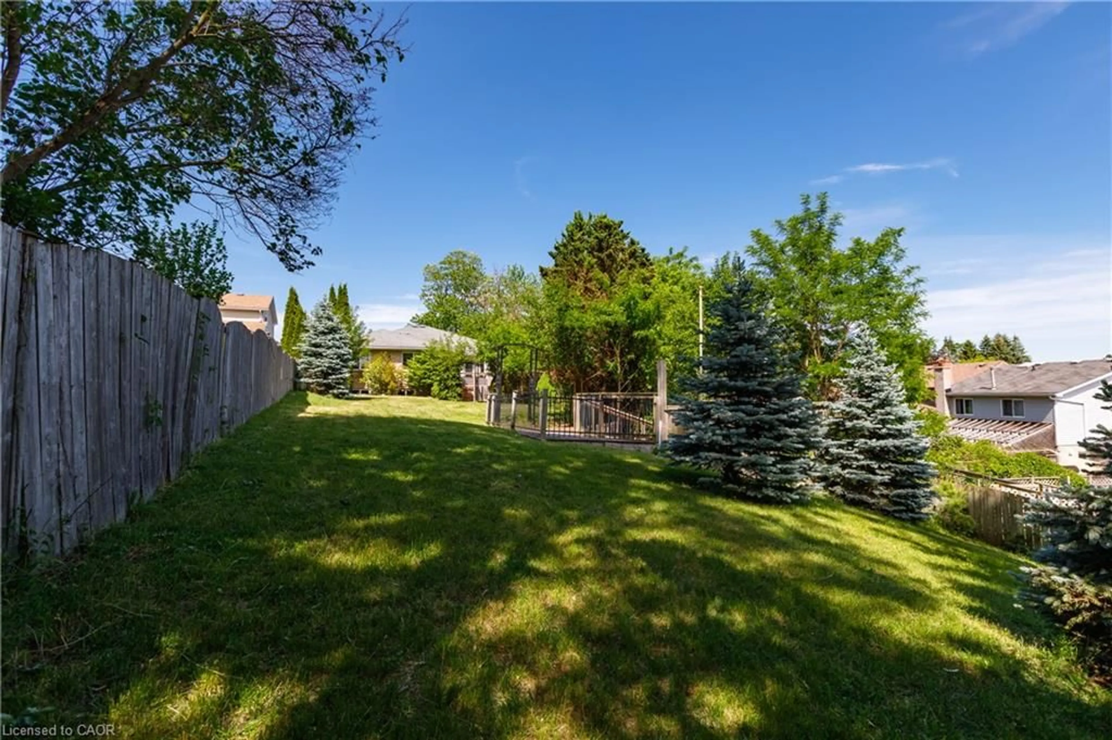 Patio, forest/trees view for 907 Doon Village Rd, Kitchener Ontario N2P 1A1