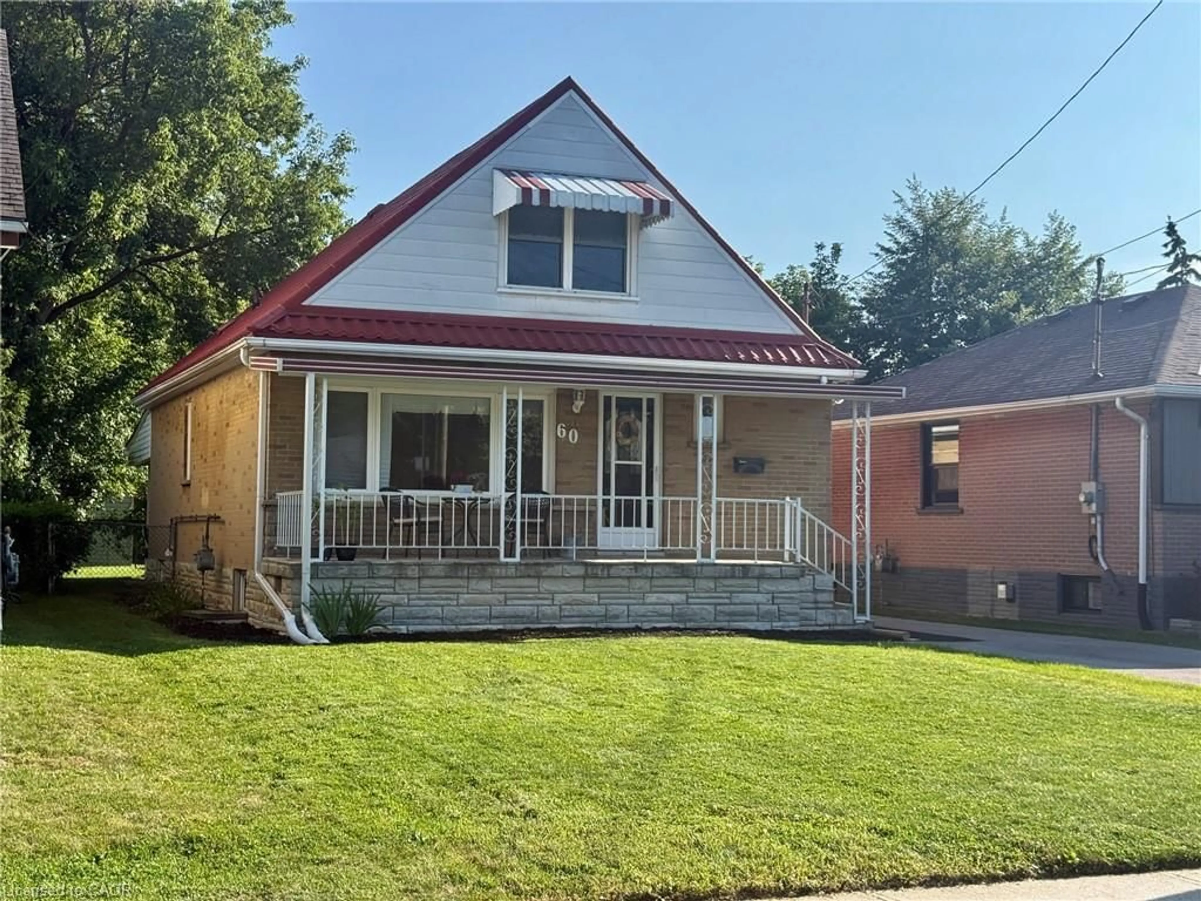 Home with brick exterior material, street for 60 Howe Ave, Hamilton Ontario L9A 1W9