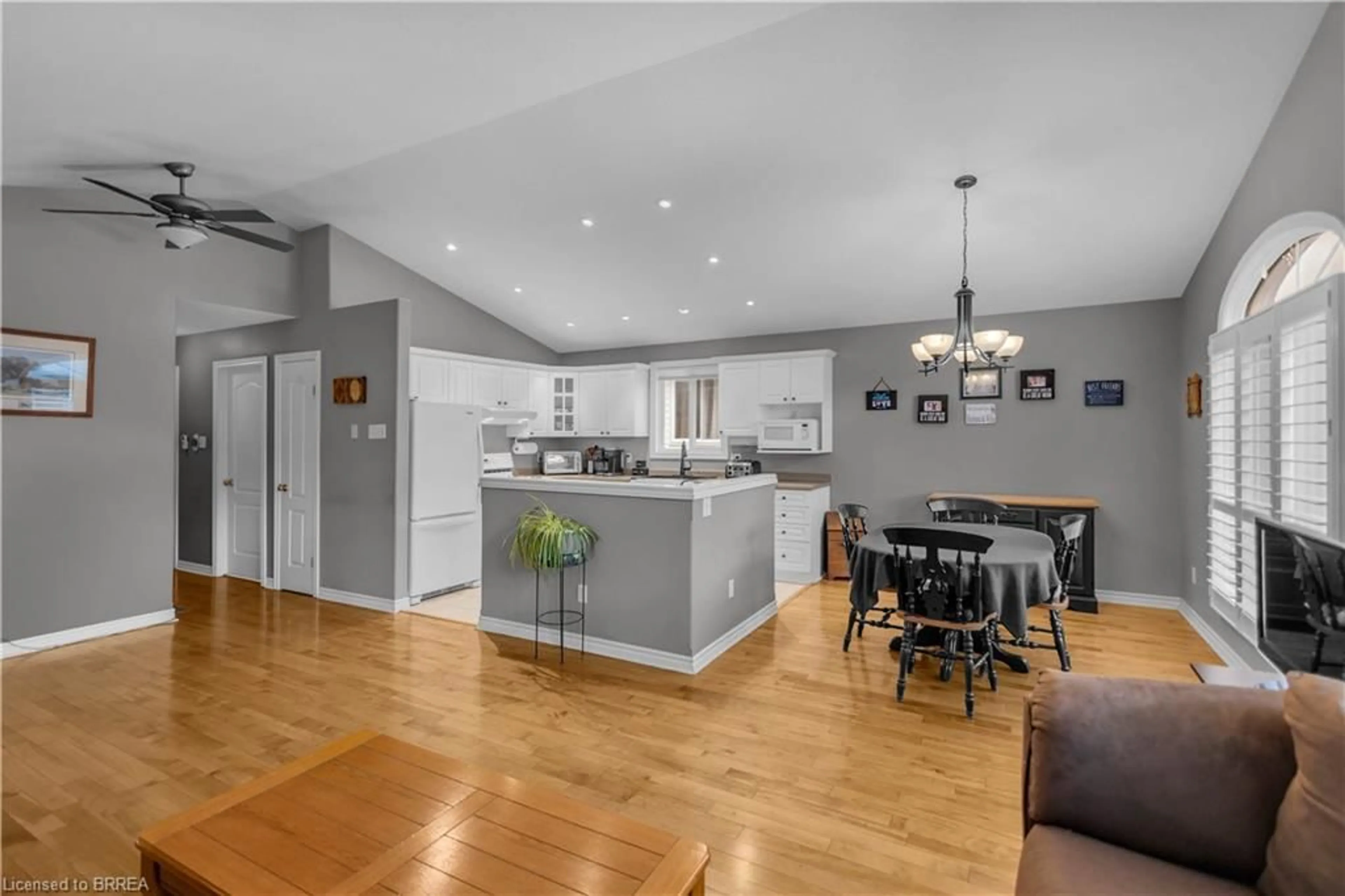 Open concept kitchen, wood/laminate floor for 5 Passmore Crt, Brantford Ontario N3R 1W7