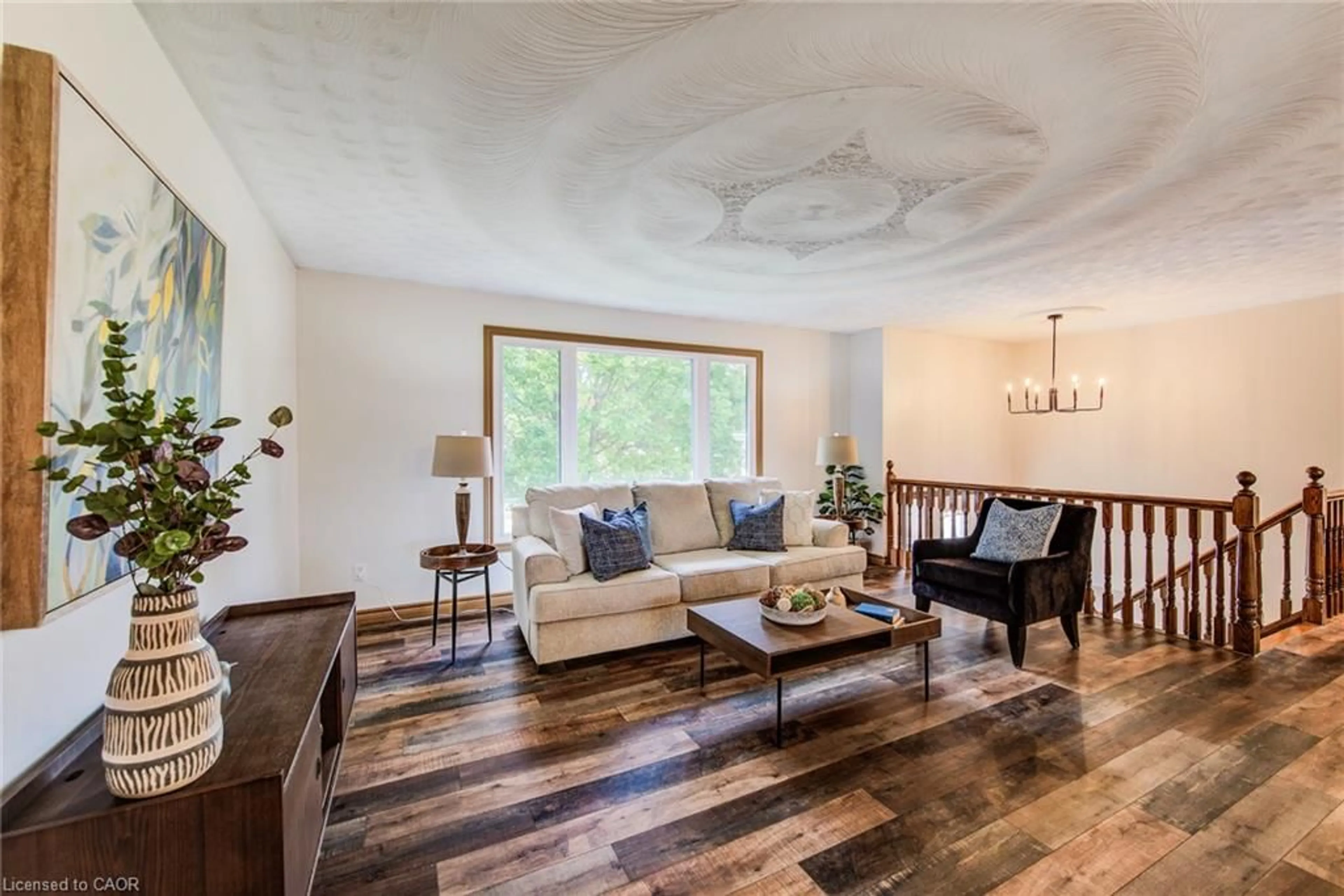 Living room with furniture, wood/laminate floor for 185 Blackwell Dr, Kitchener Ontario N2N 2S2
