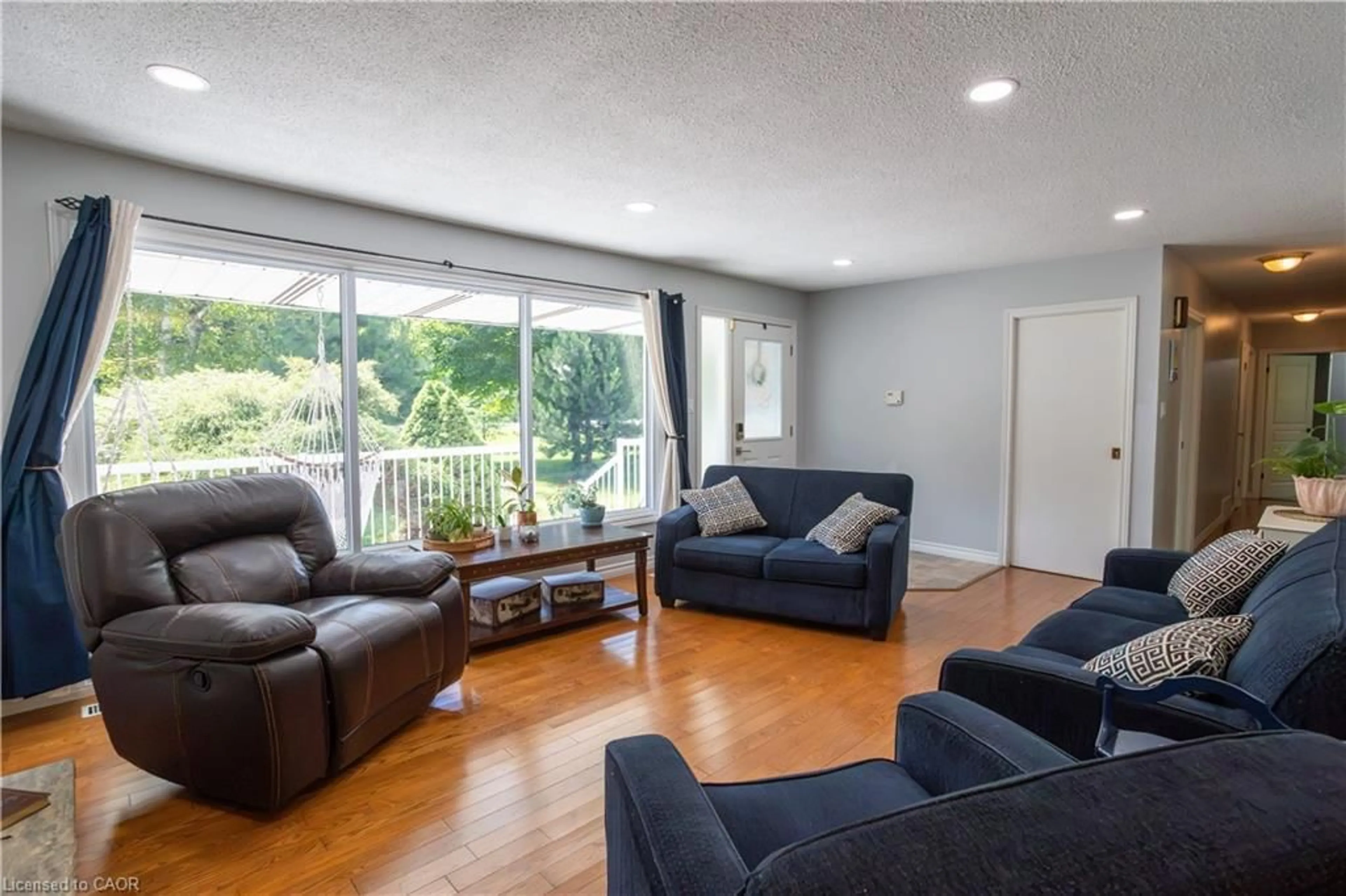 Living room with furniture, wood/laminate floor for 4710 #59 Hwy, Norfolk County Ontario N0J 1E0