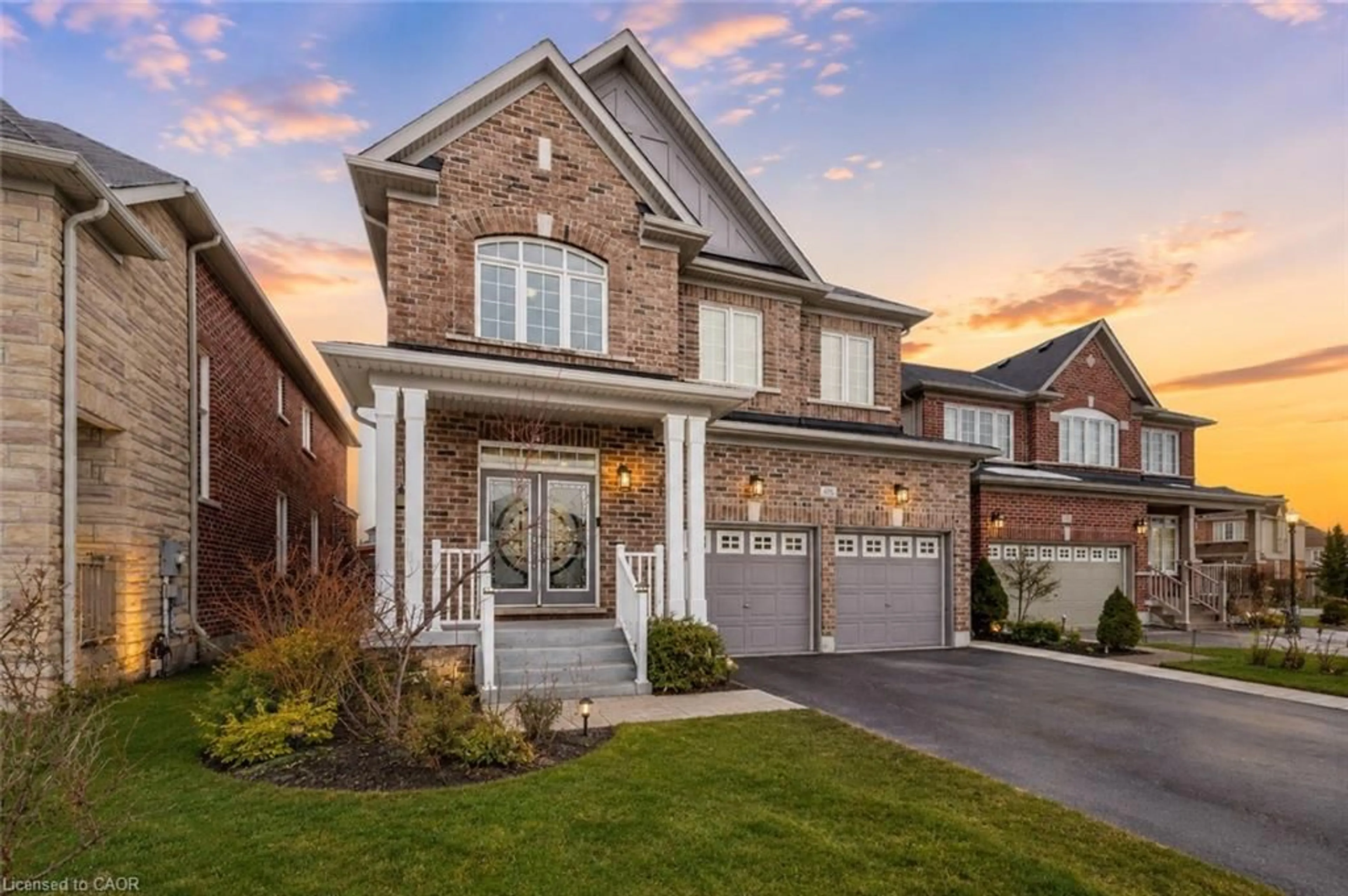 Home with brick exterior material, street for 498 Thomas Slee Dr, Kitchener Ontario N2P 2Y1