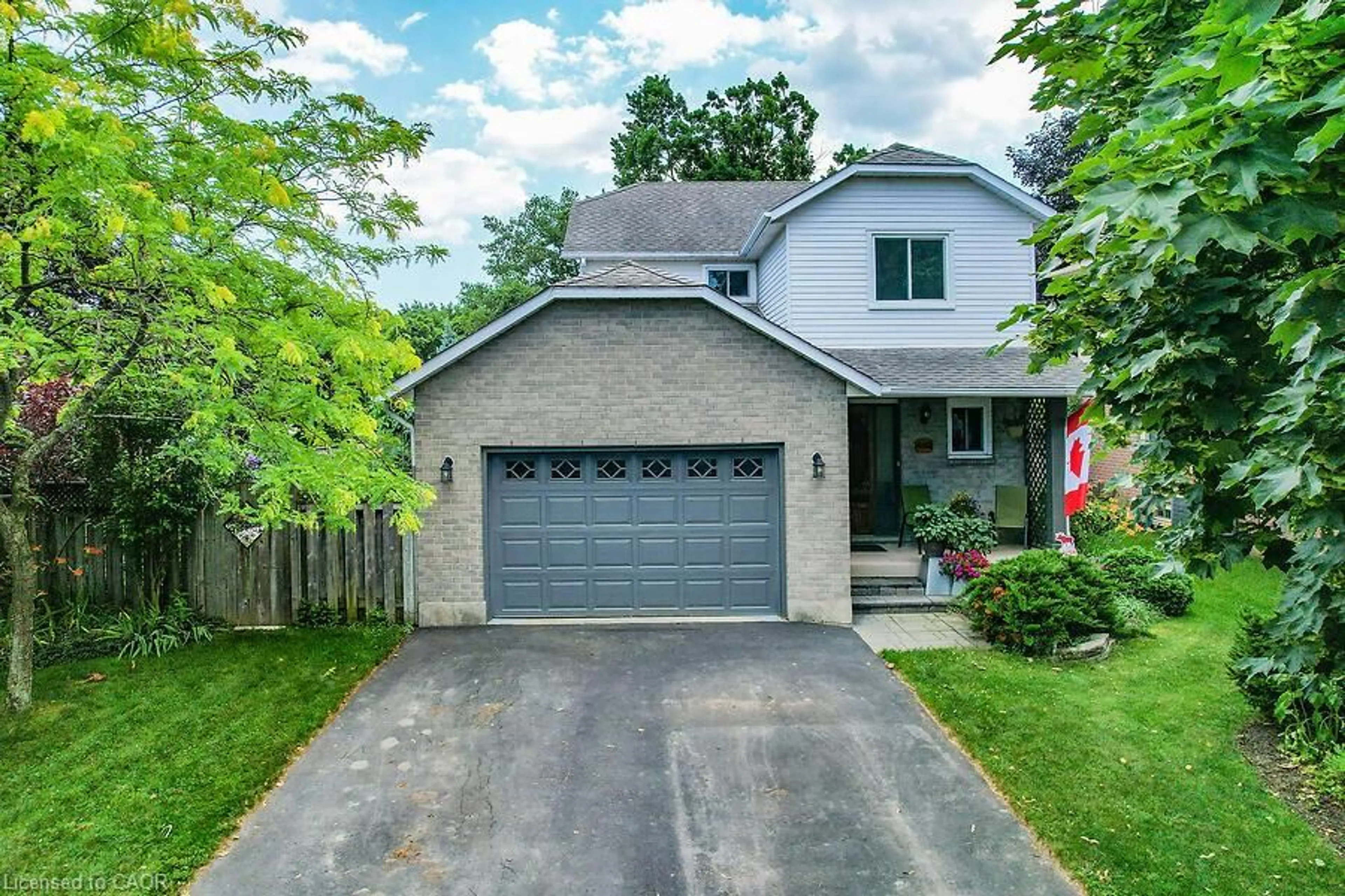 Home with brick exterior material, street for 4542 Ivy Gardens Cres, Adelard Ontario L3J 0B3