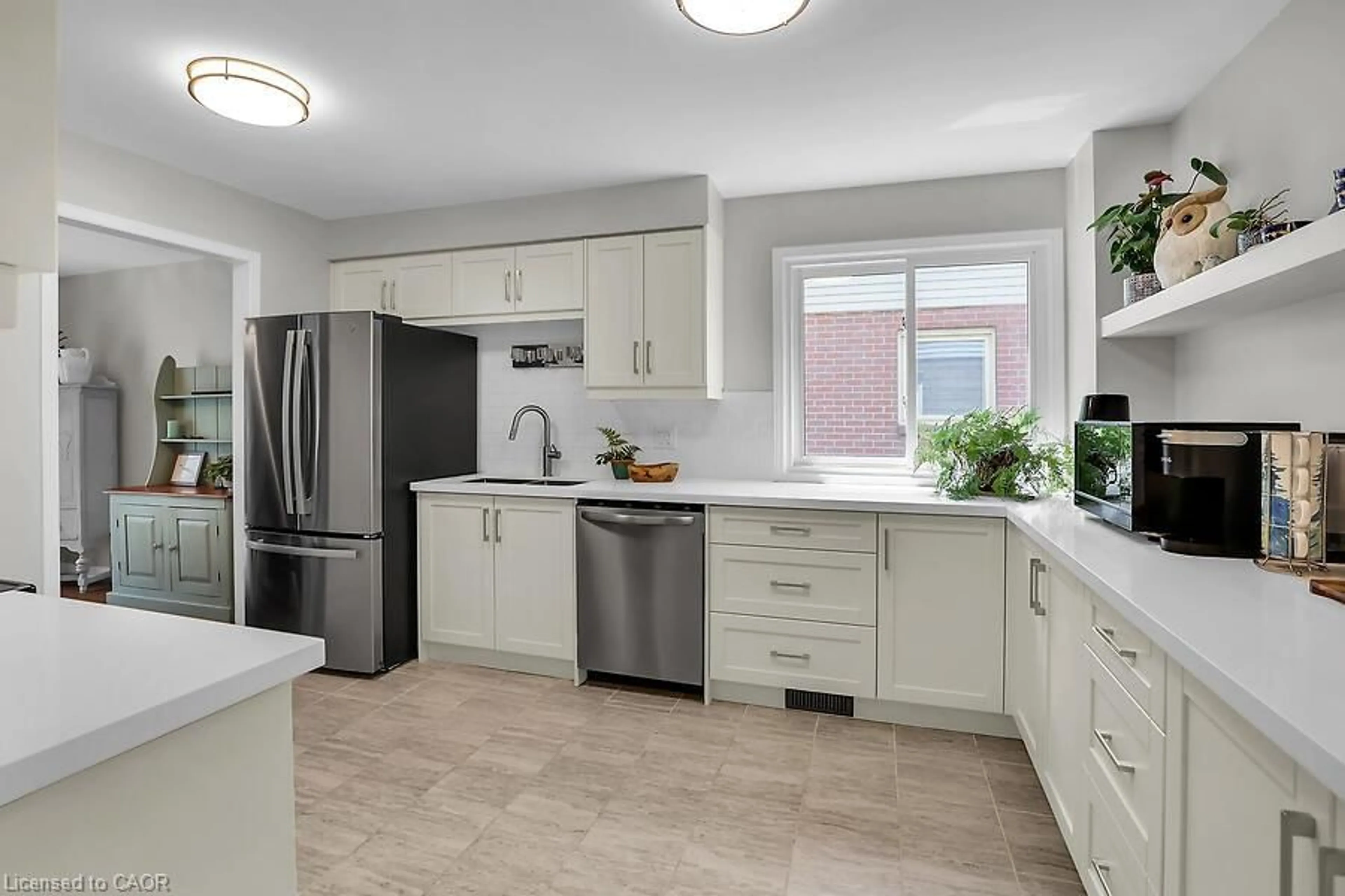 Open concept kitchen, ceramic/tile floor for 4542 Ivy Gardens Cres, Adelard Ontario L3J 0B3