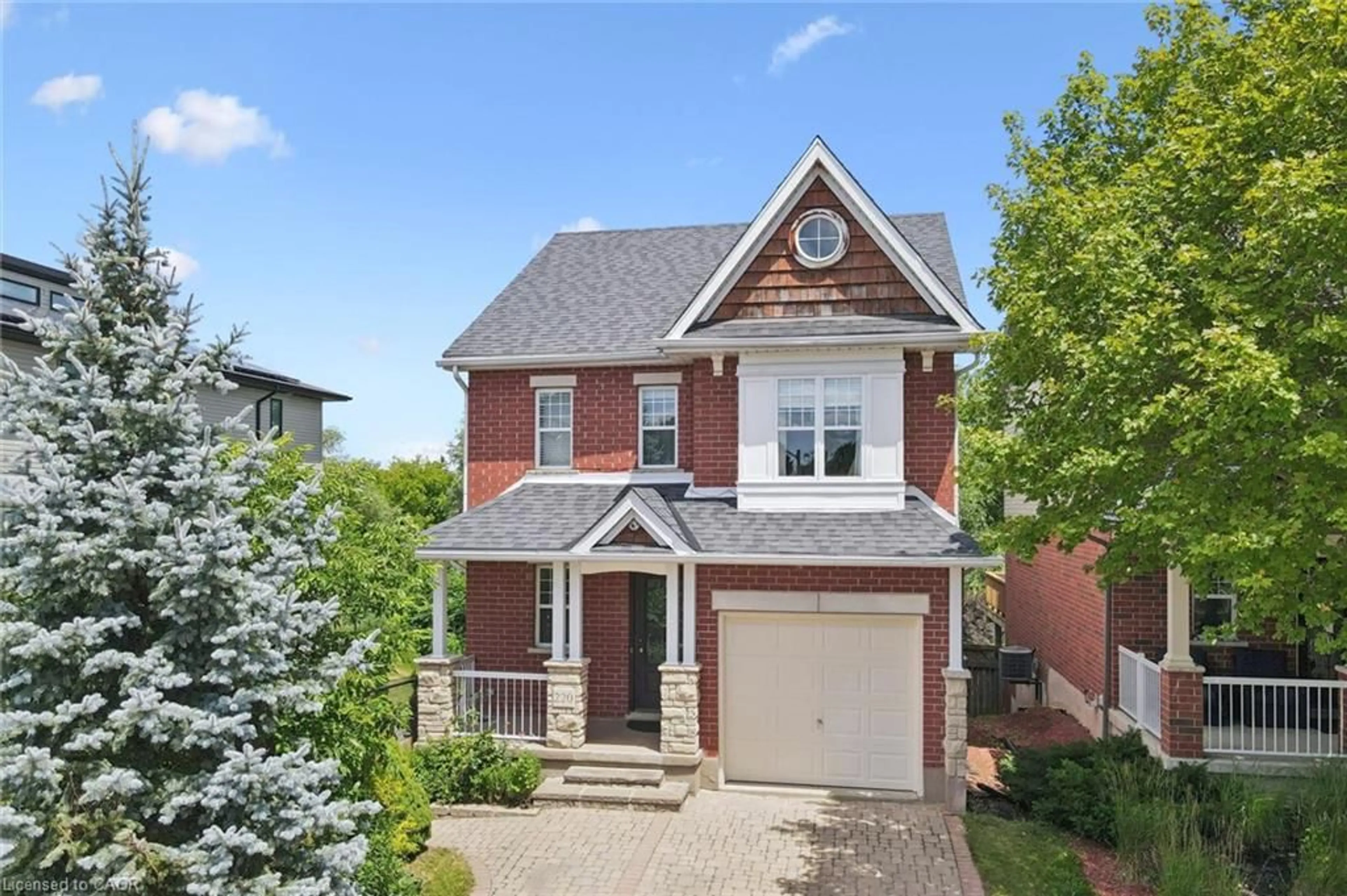 Home with brick exterior material, street for 220 Carrington Dr, Guelph Ontario N1G 5K3