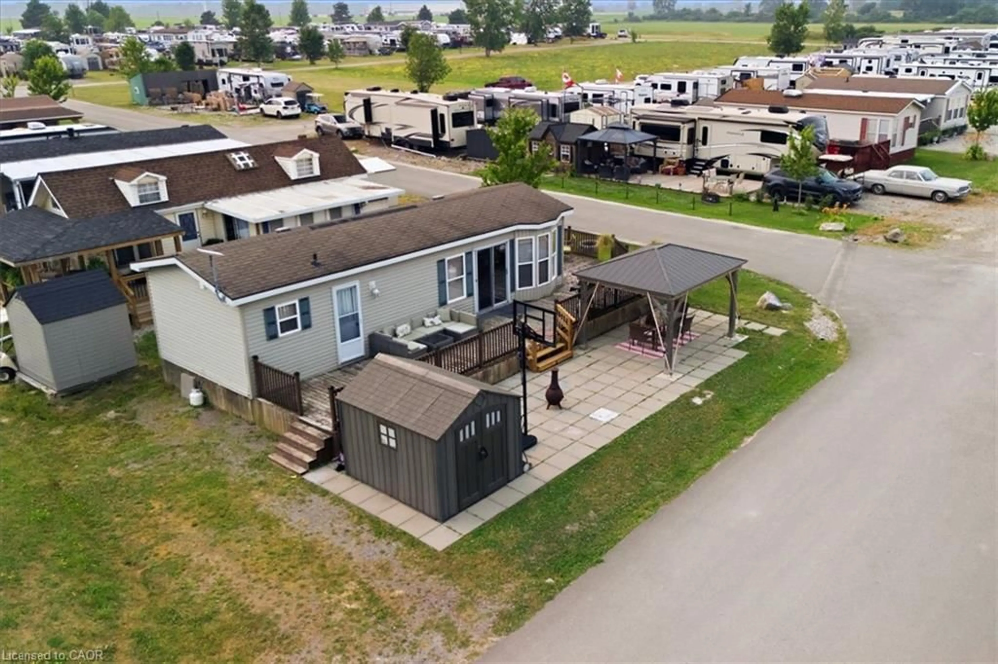 A pic from outside/outdoor area/front of a property/back of a property/a pic from drone, unknown for 659 Port Maitland Rd #54L, Dunnville Ontario N1A 2W6