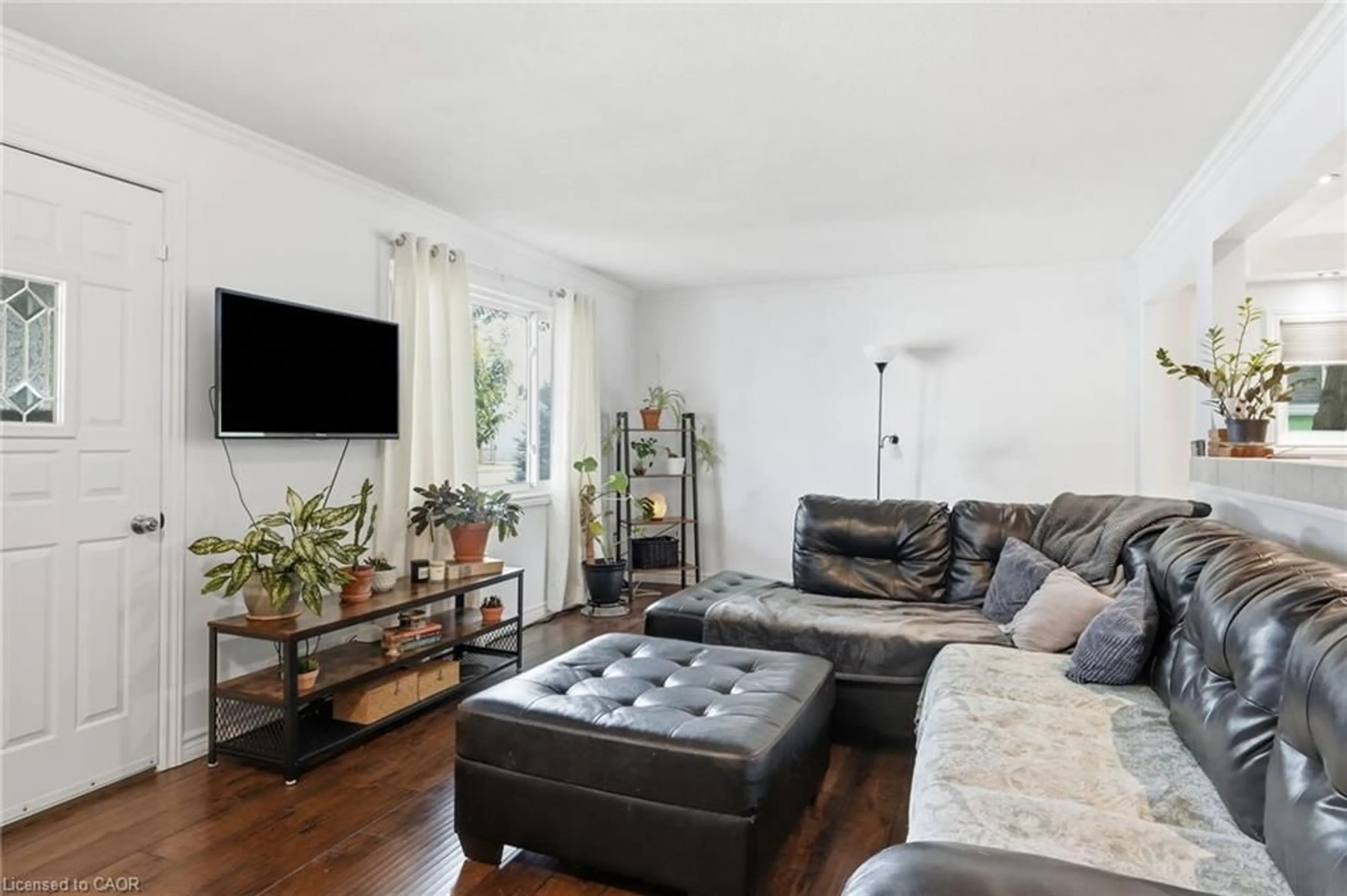 Living room with furniture, wood/laminate floor for 432 Upper Sherman Ave, Hamilton Ontario L8V 3L5