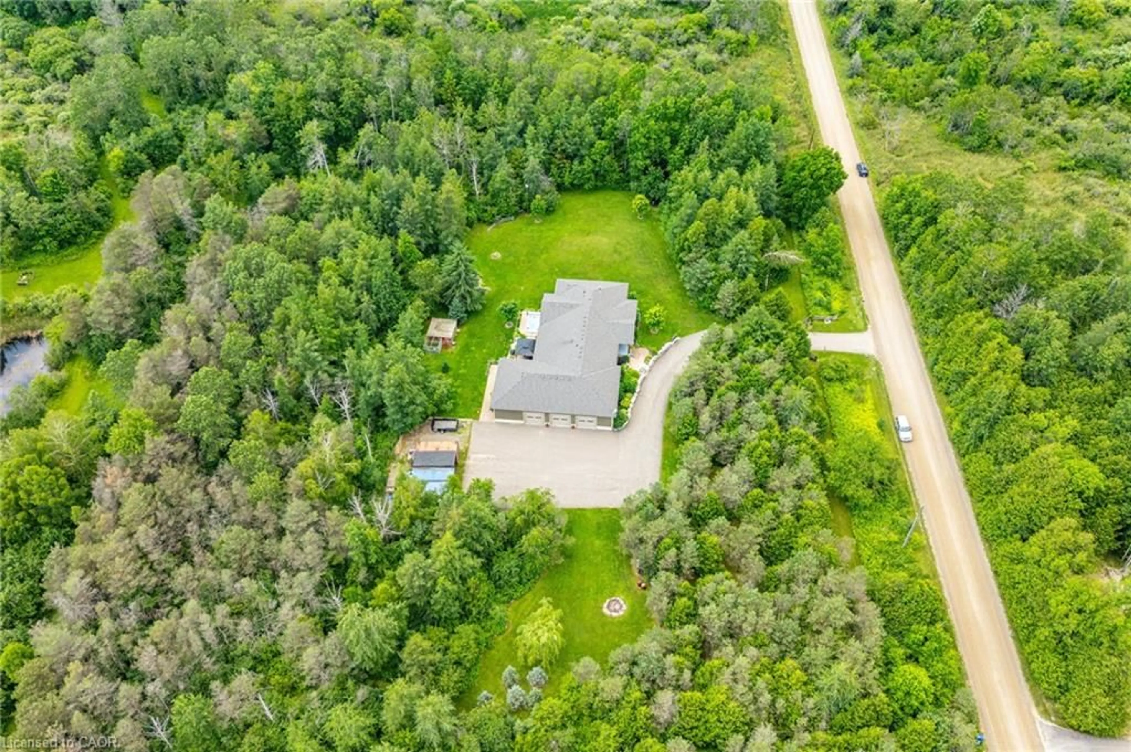 A pic from outside/outdoor area/front of a property/back of a property/a pic from drone, forest/trees view for 5594 First Line, Erin Ontario N0B 1Z0