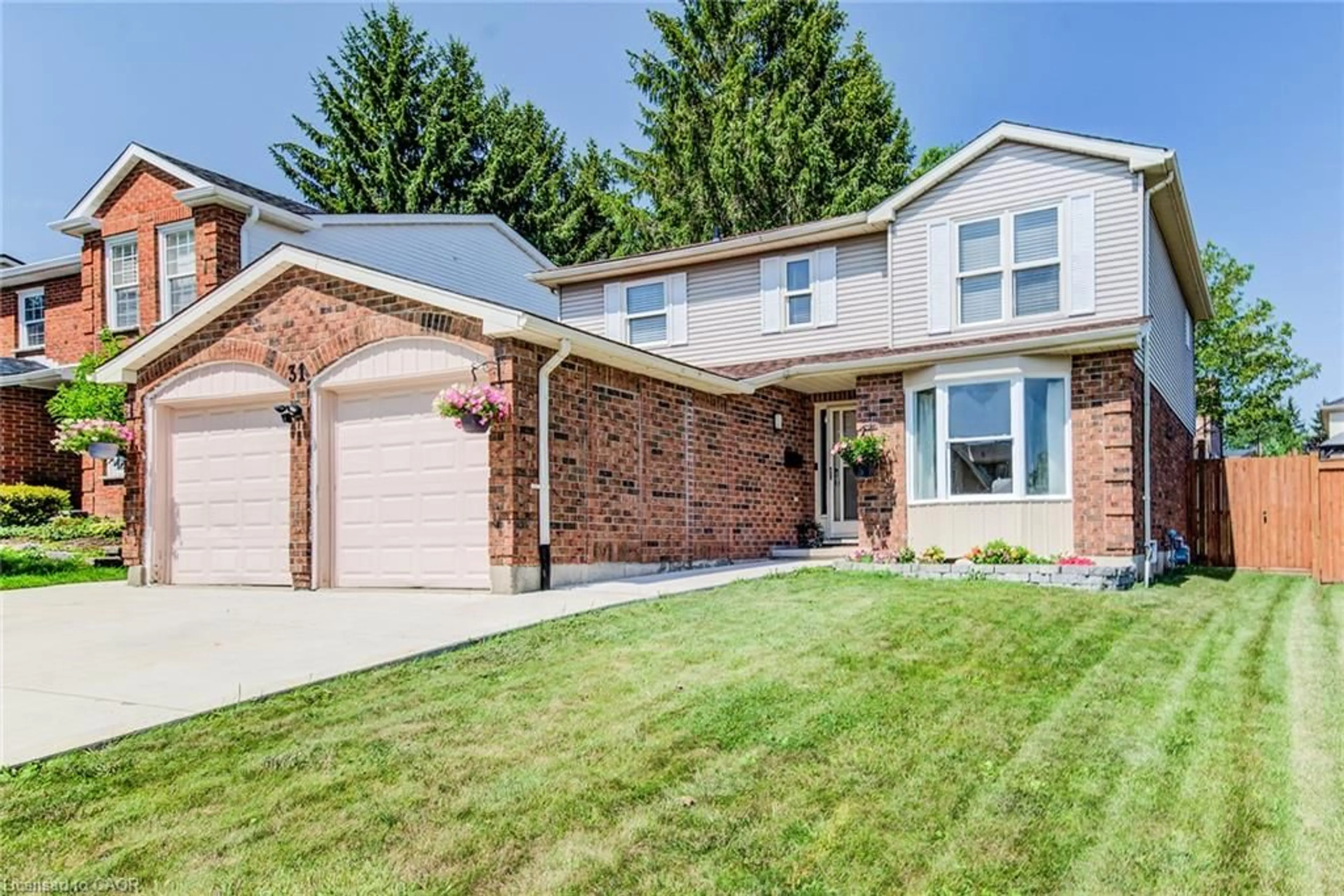 Home with brick exterior material, street for 31 Old Maple Lane, Kitchener Ontario N2N 2K4