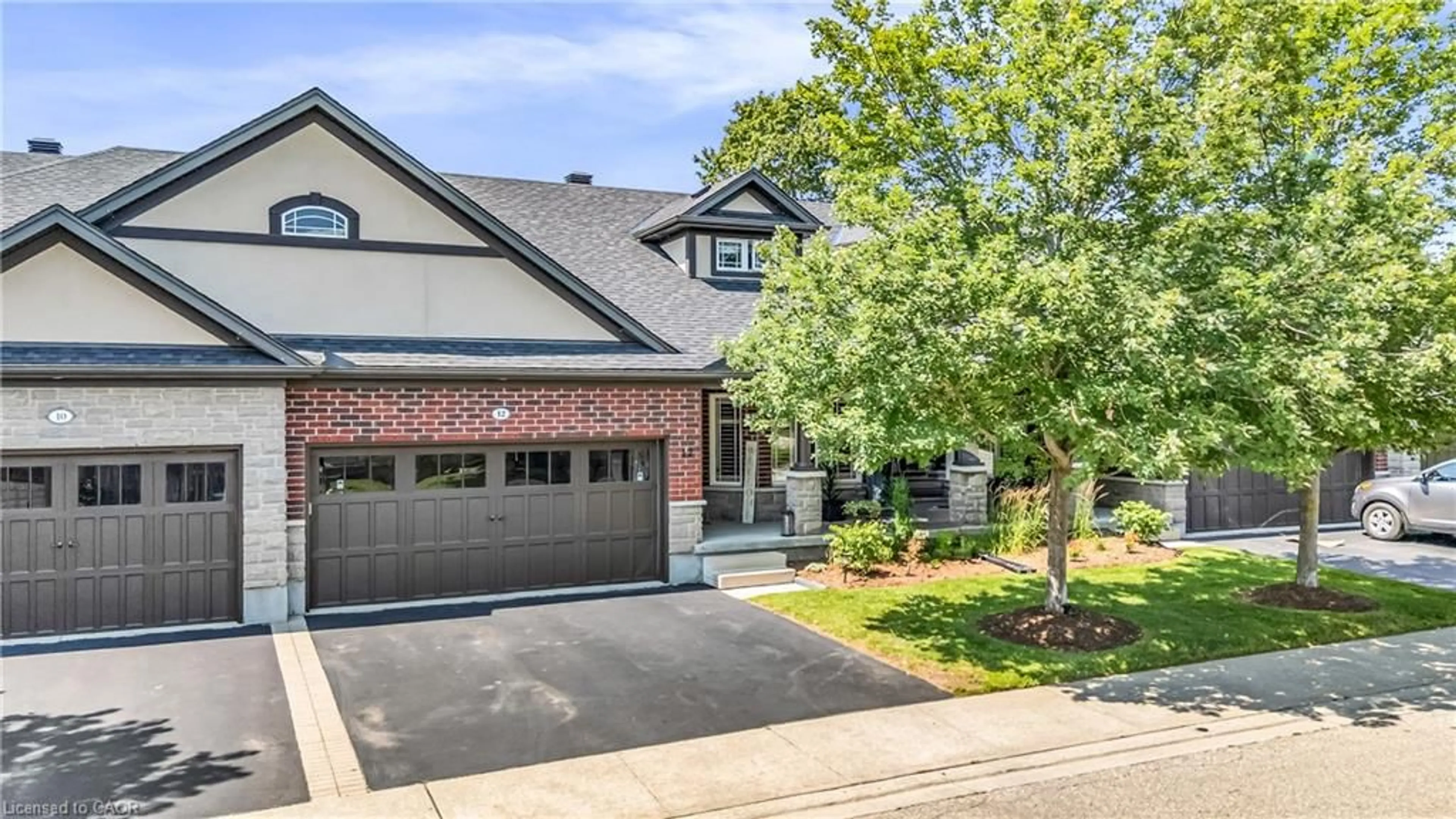 Home with brick exterior material, street for 12 Annmoore Cres #19, Guelph Ontario N1L 0J1