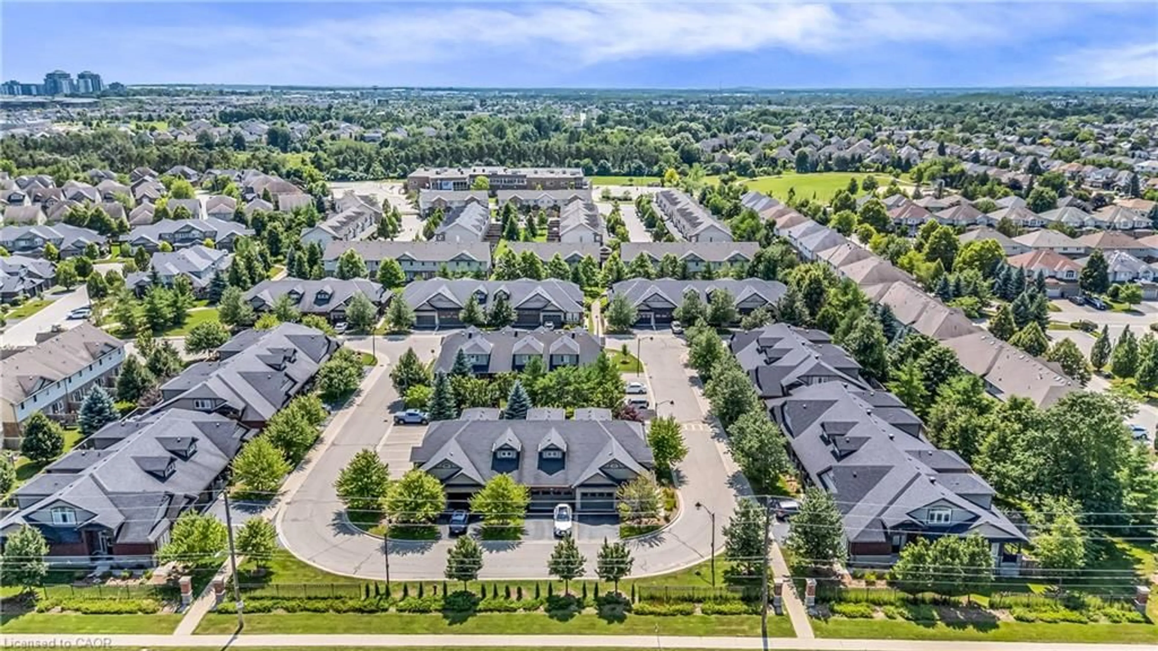 A pic from outside/outdoor area/front of a property/back of a property/a pic from drone, street for 12 Annmoore Cres #19, Guelph Ontario N1L 0J1