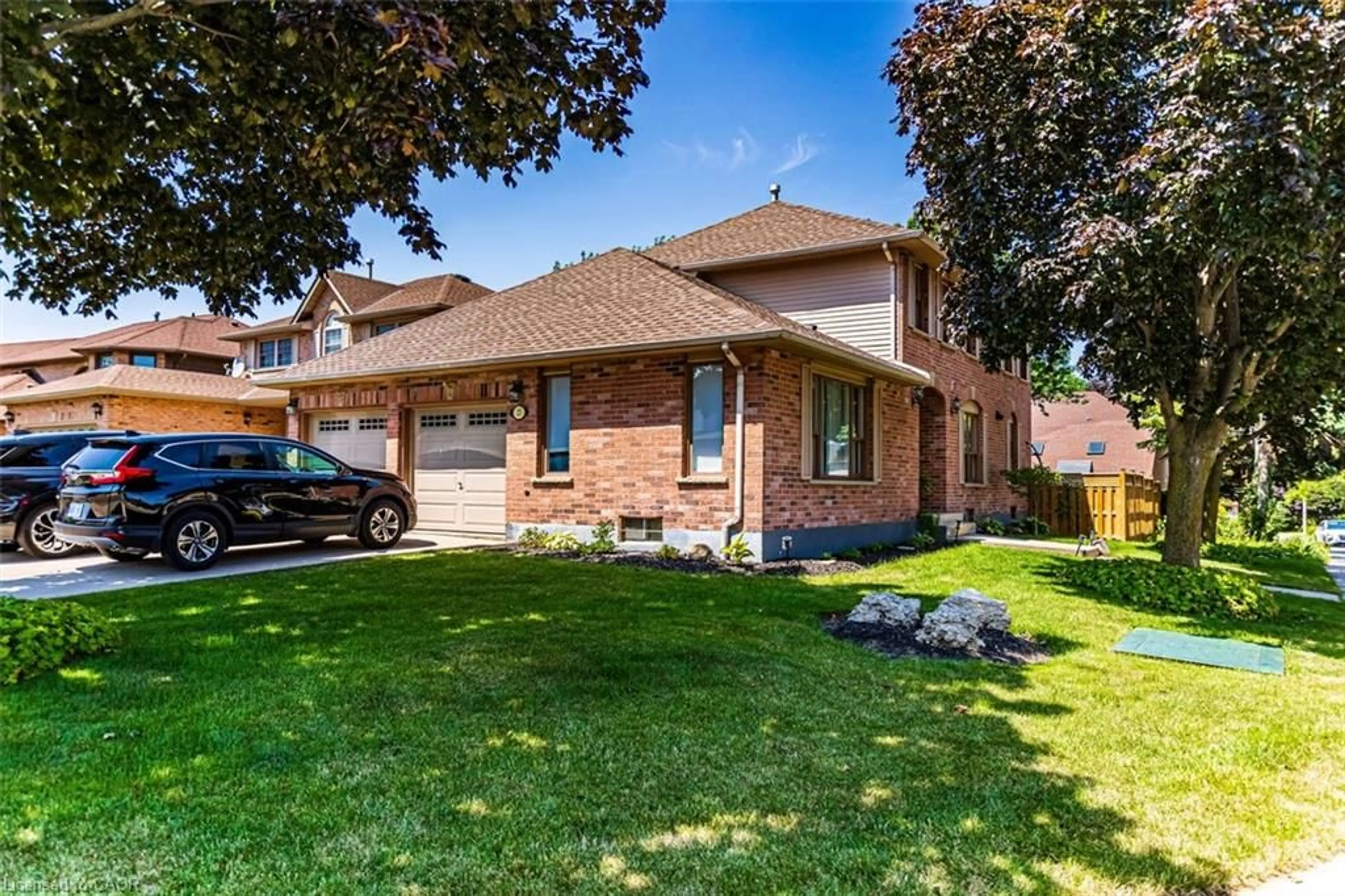 Home with brick exterior material, street for 23 Avonmore Crt, Hamilton Ontario L8W 3G8