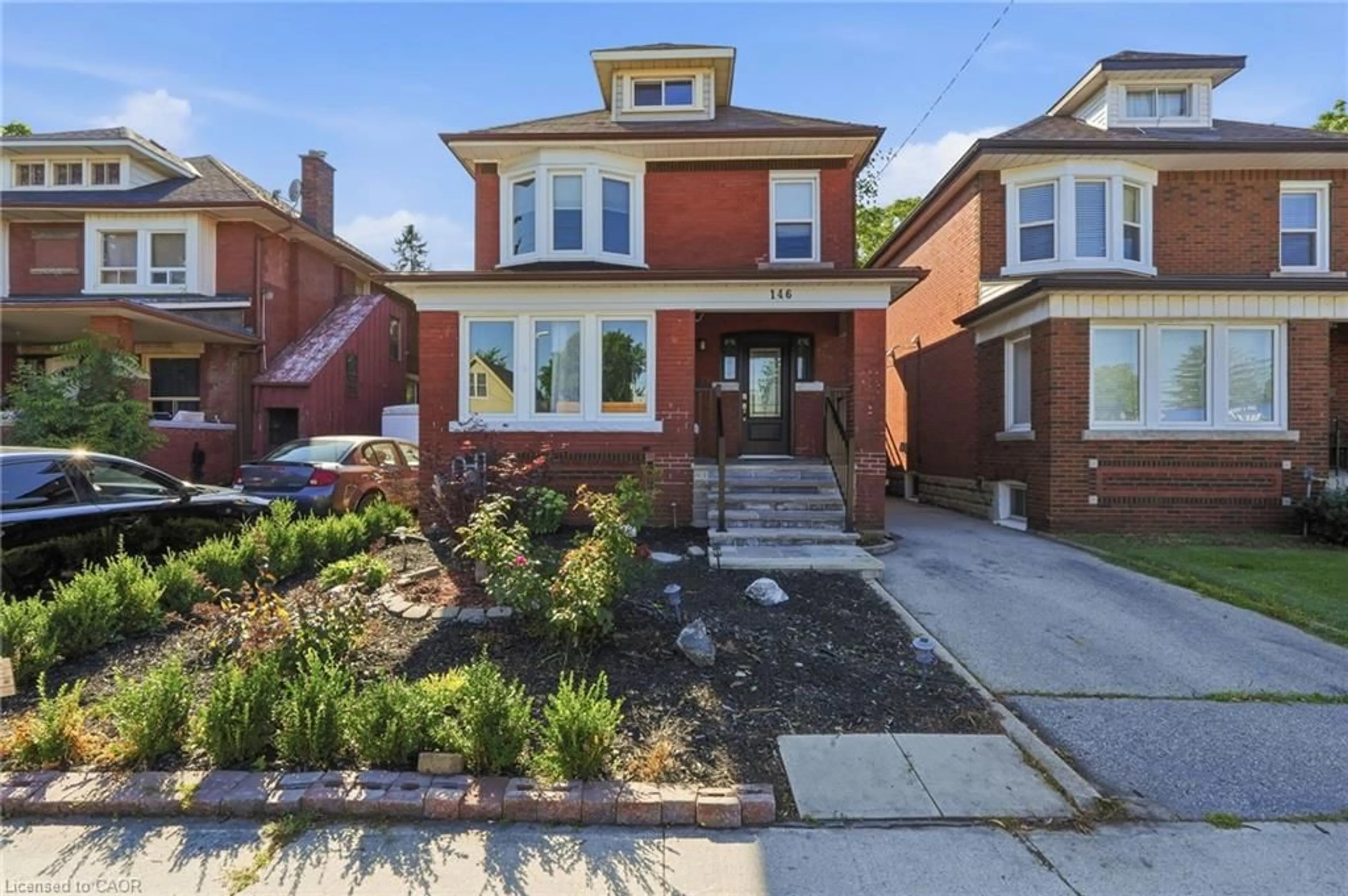 Home with brick exterior material, street for 146 Ottawa St, Hamilton Ontario L8K 2E4