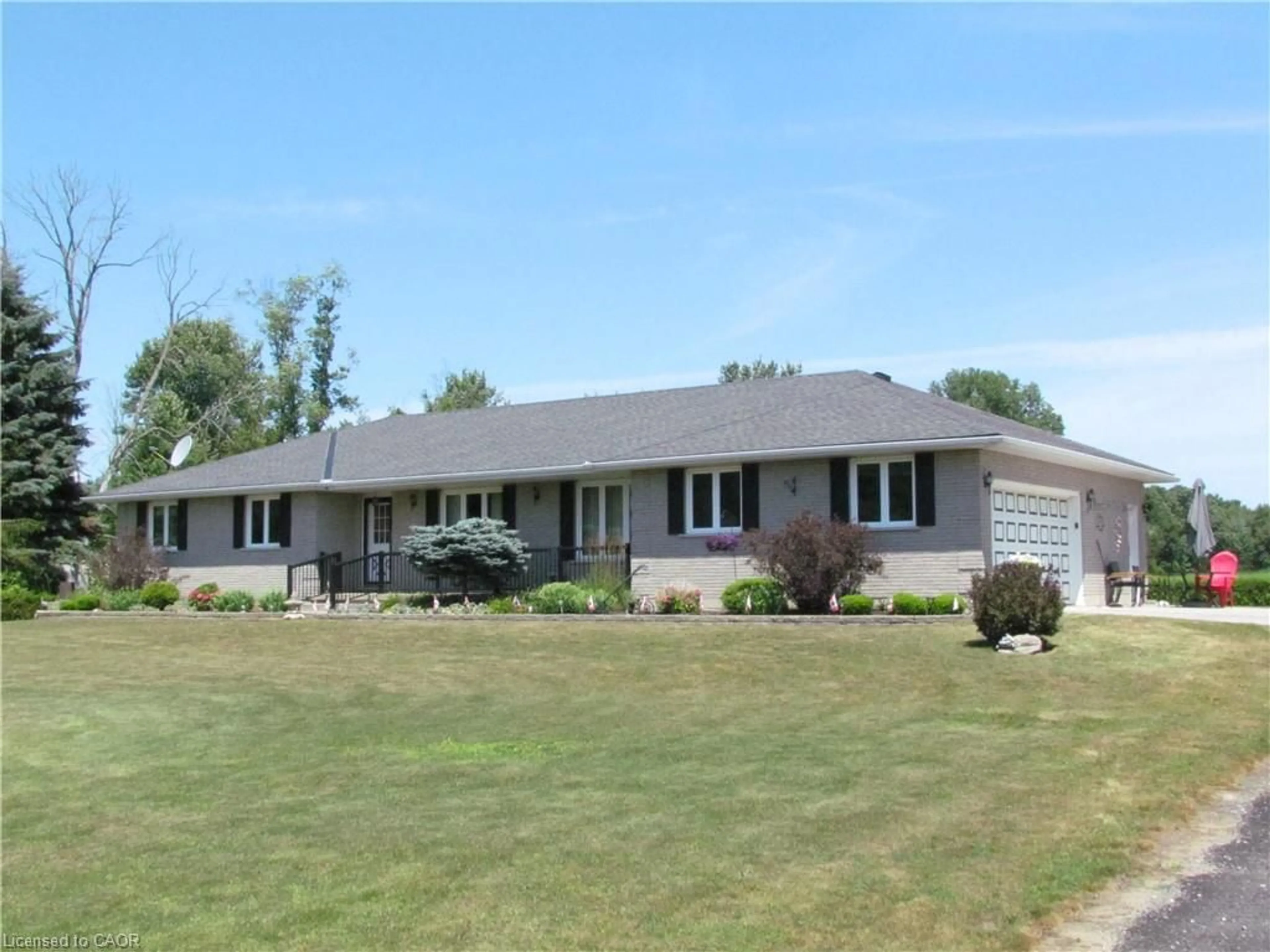 Home with vinyl exterior material, street for 1325 Lakeshore Rd, Clear Creek Ontario N0E 1C0