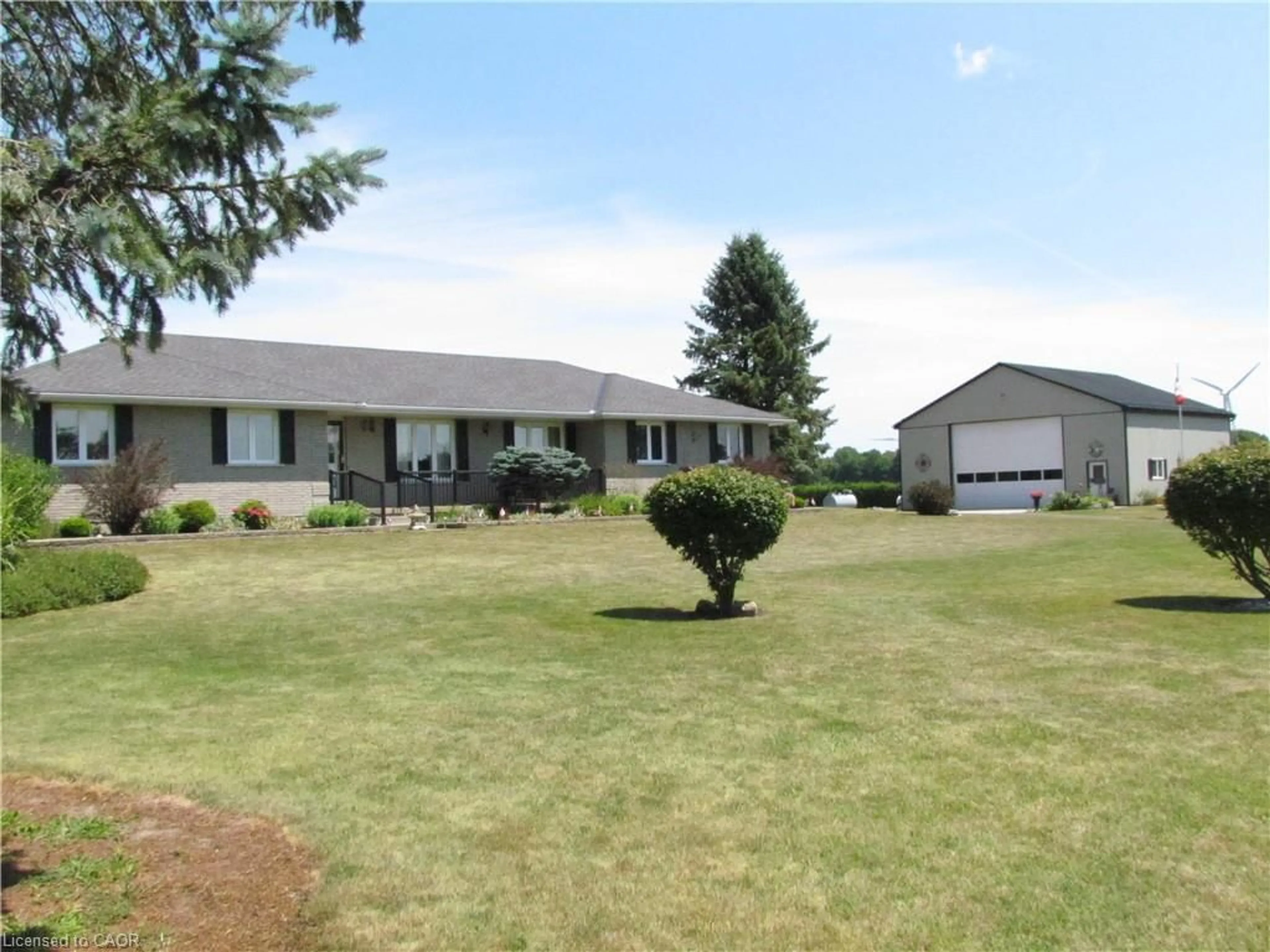 A pic from outside/outdoor area/front of a property/back of a property/a pic from drone, unknown for 1325 Lakeshore Rd, Clear Creek Ontario N0E 1C0