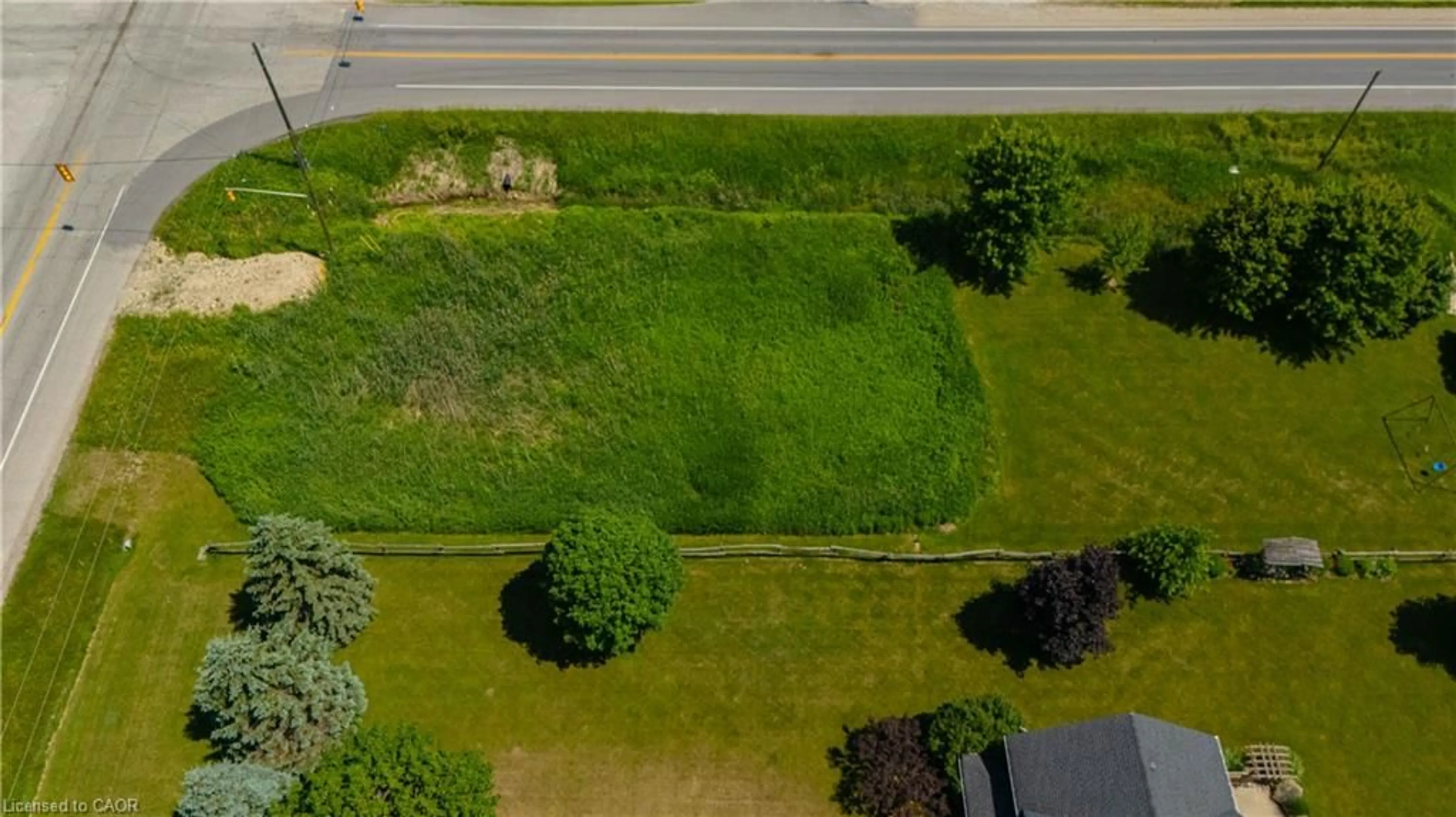 A pic from outside/outdoor area/front of a property/back of a property/a pic from drone, water/lake/river/ocean view for 7462 Wellington Rd 11, Moorefield Ontario N0G 2K0