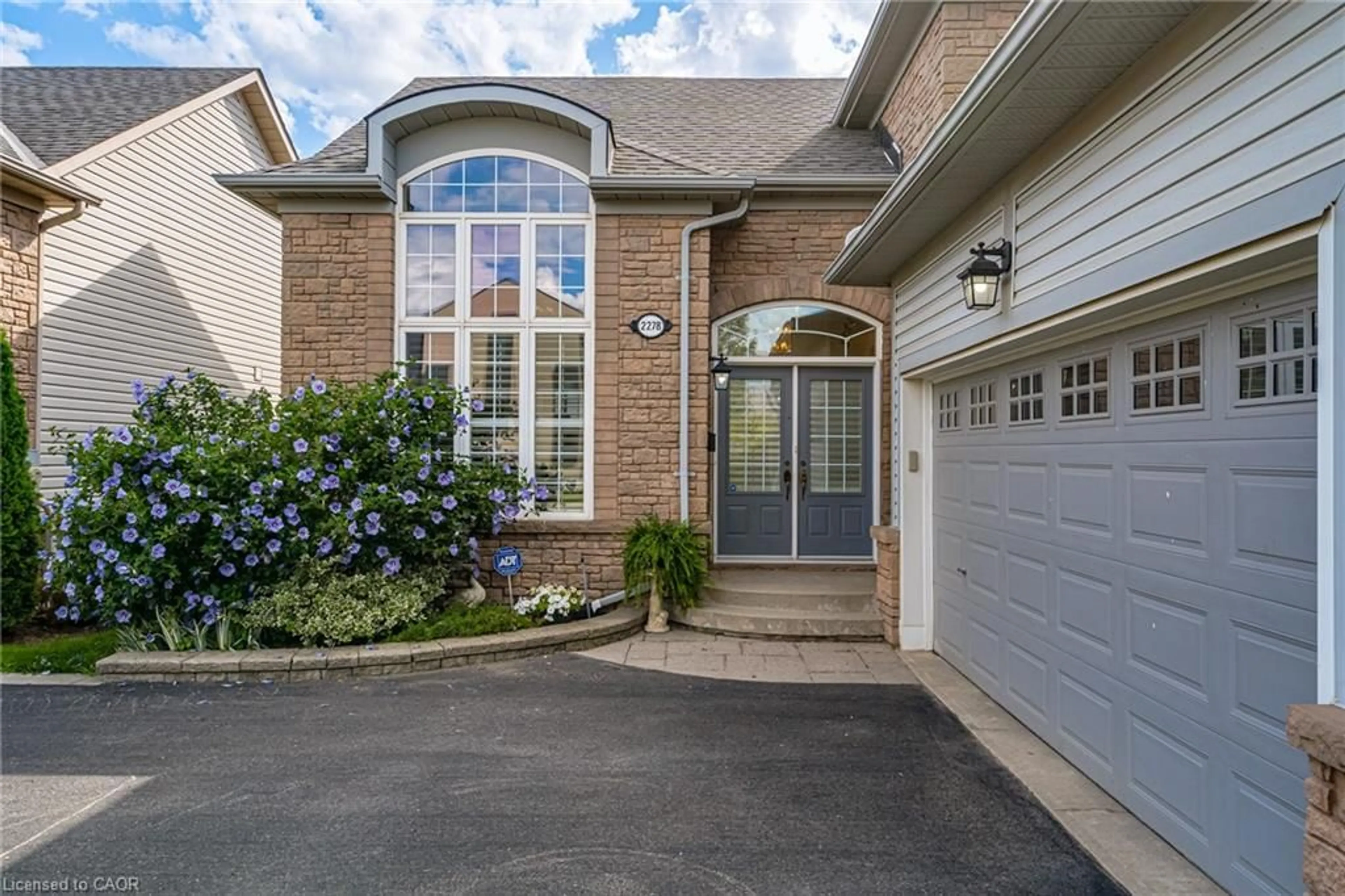 Home with brick exterior material, street for 2278 Turnberry Rd #13, Burlington Ontario L7M 4S6