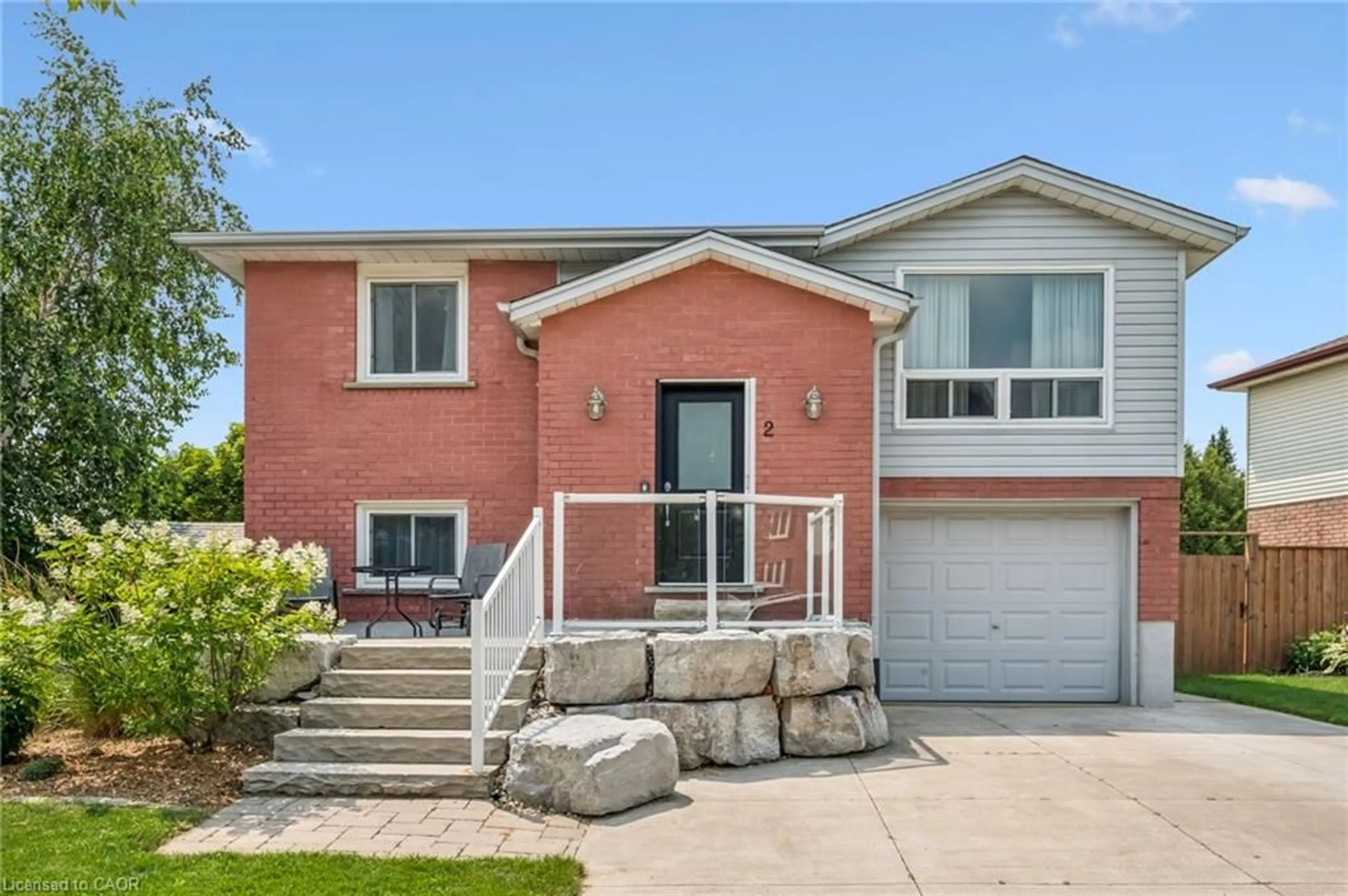 Home with brick exterior material, street for 2 Newbury Dr, Kitchener Ontario N2N 2W7
