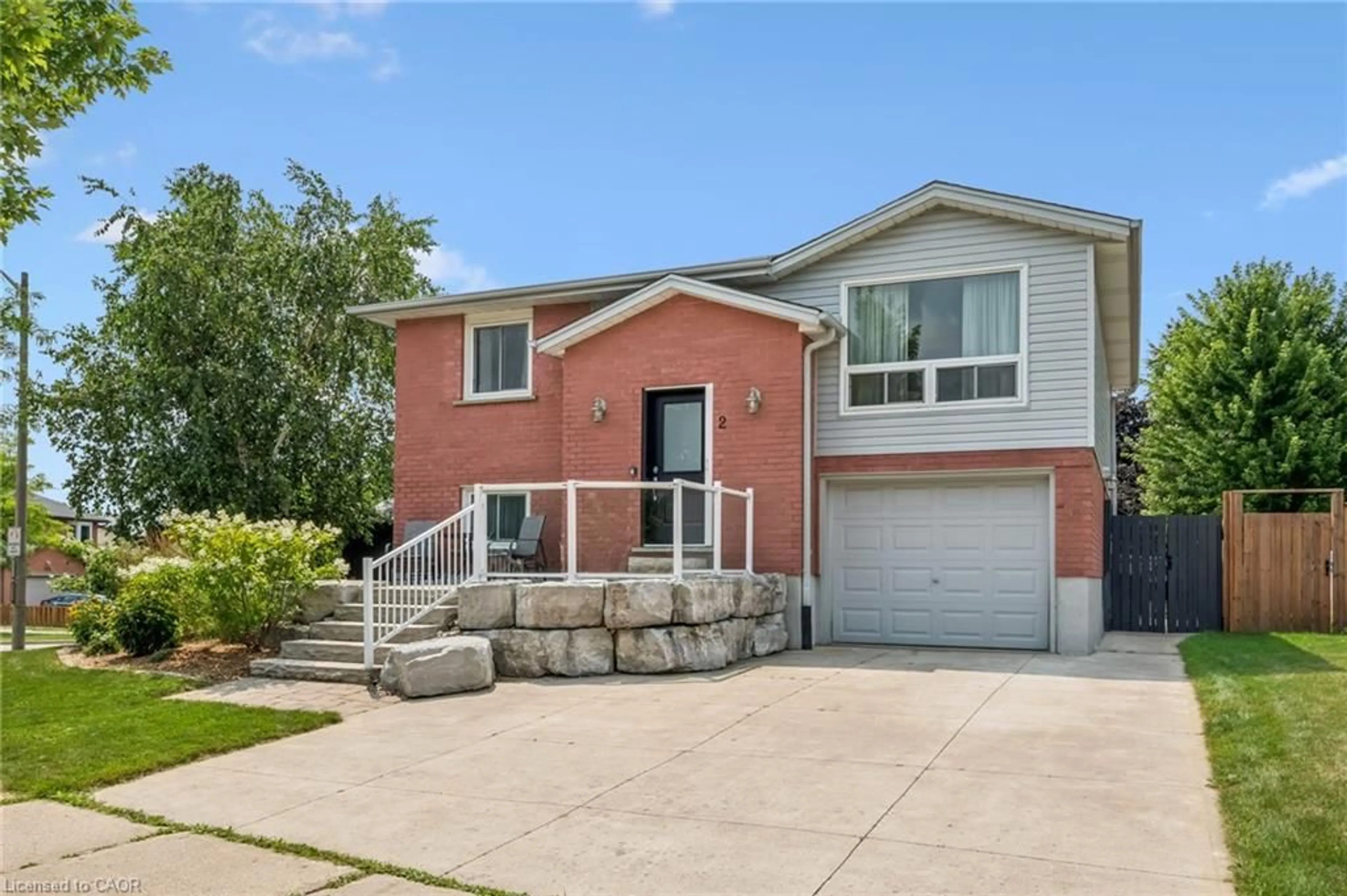 Home with brick exterior material, street for 2 Newbury Dr, Kitchener Ontario N2N 2W7
