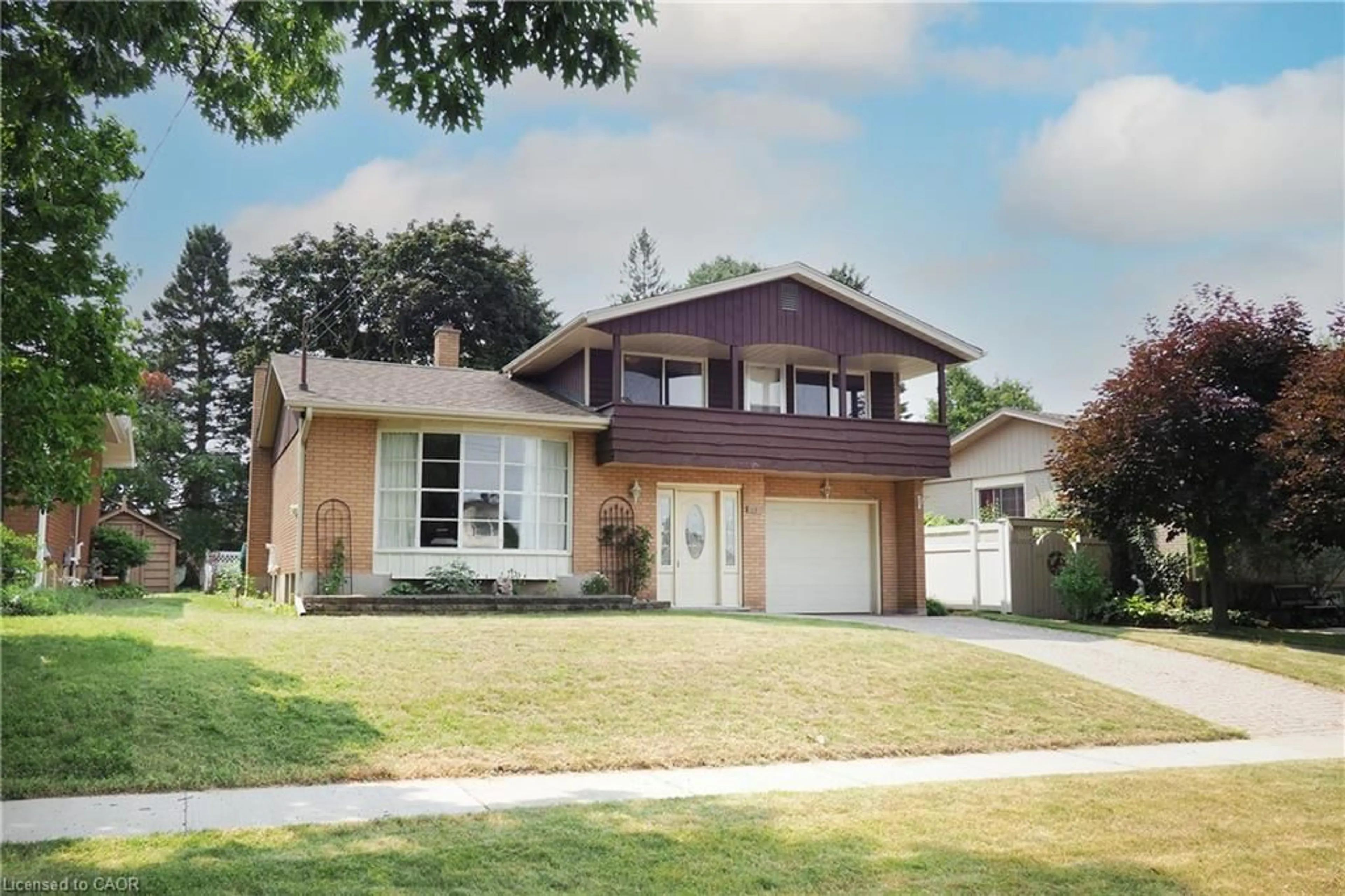 Home with vinyl exterior material, street for 15 Gilmour Cres, Kitchener Ontario N2M 4N5
