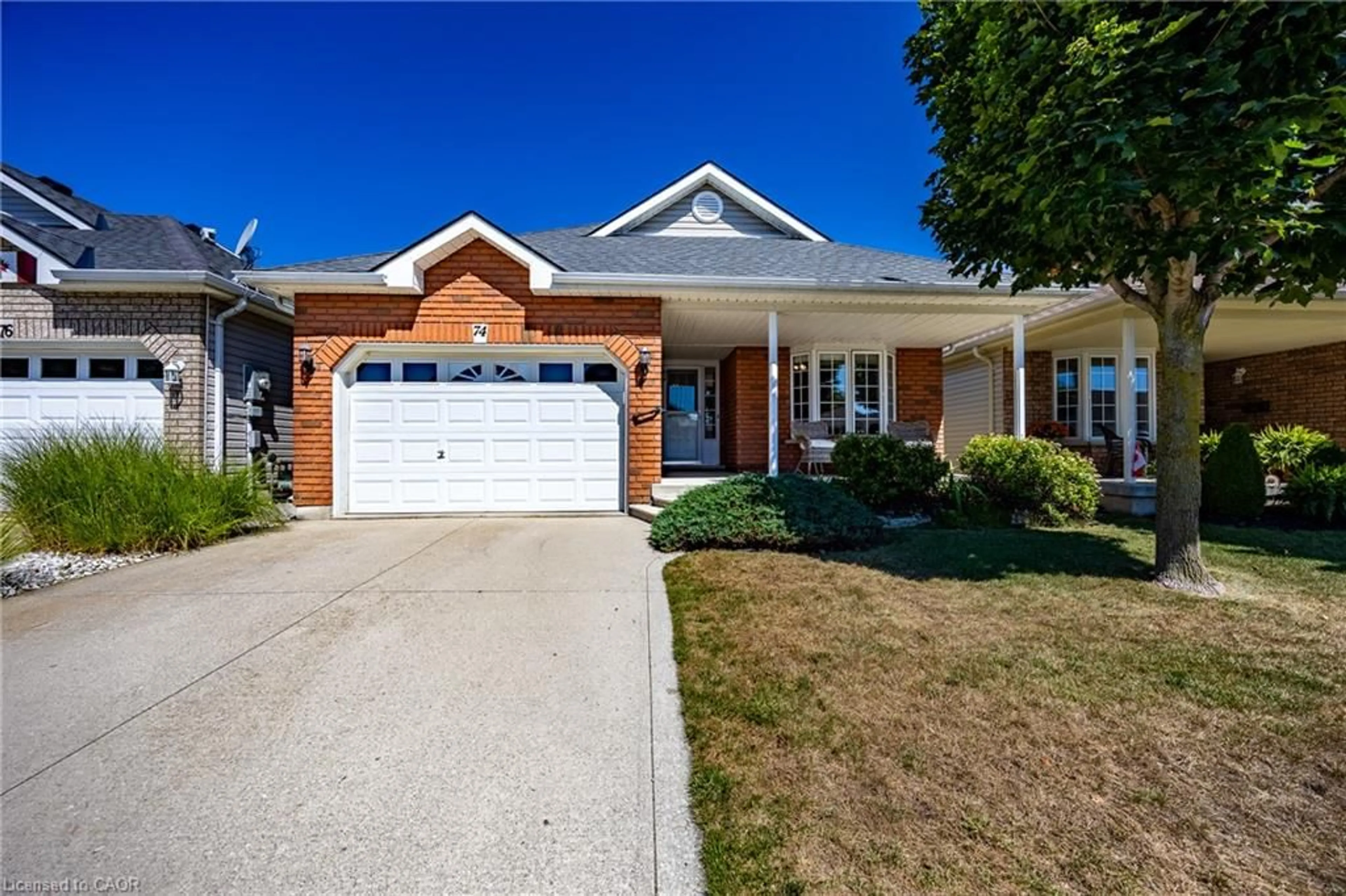 Home with brick exterior material, street for 74 Balsam Trail, Port Rowan Ontario N0E 1M0