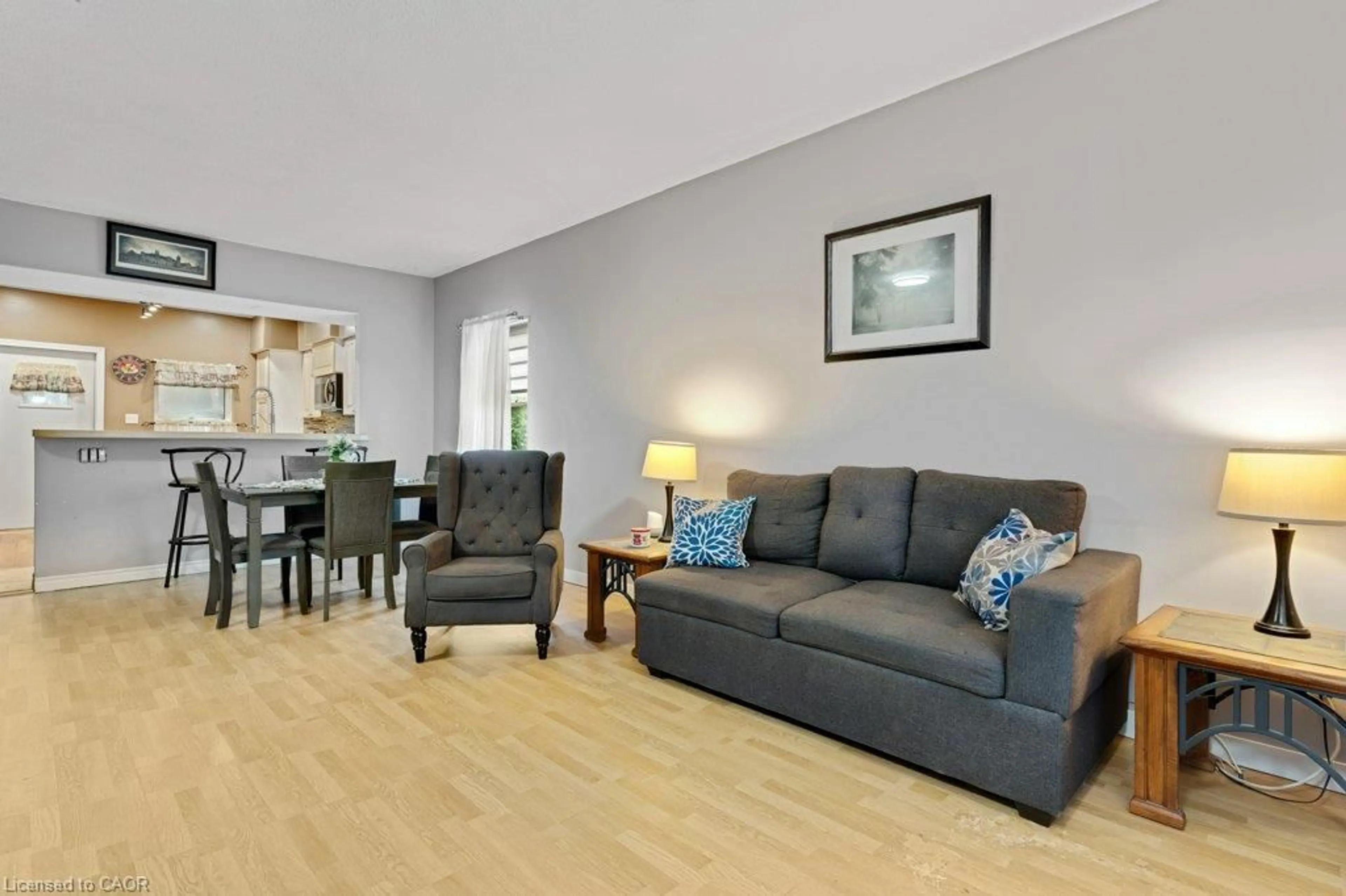 Living room with furniture, wood/laminate floor for 456 Margaret St, Cambridge Ontario N3H 3X7