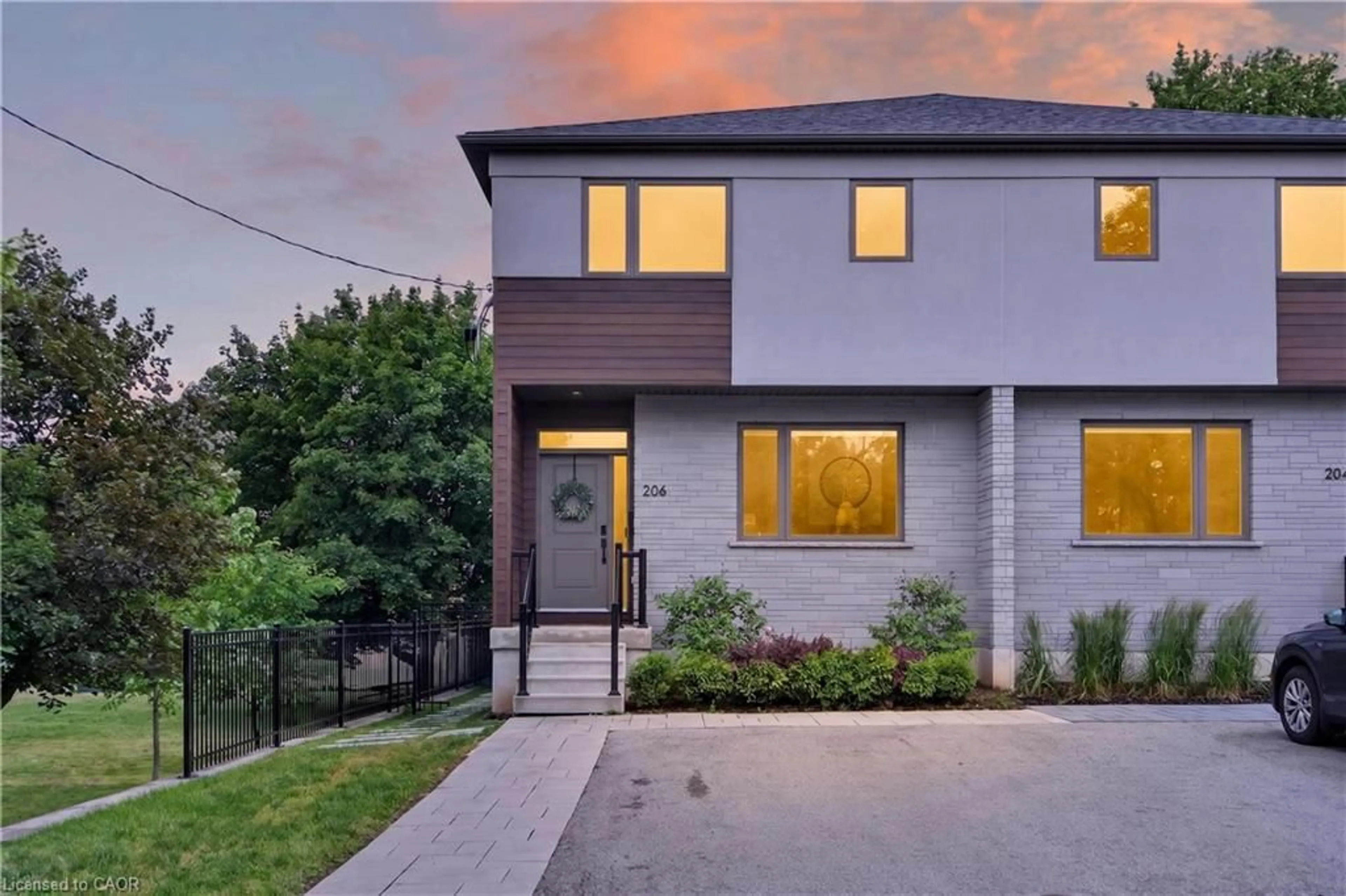 Home with brick exterior material, street for 206 Canada St, Hamilton Ontario L8P 1P6