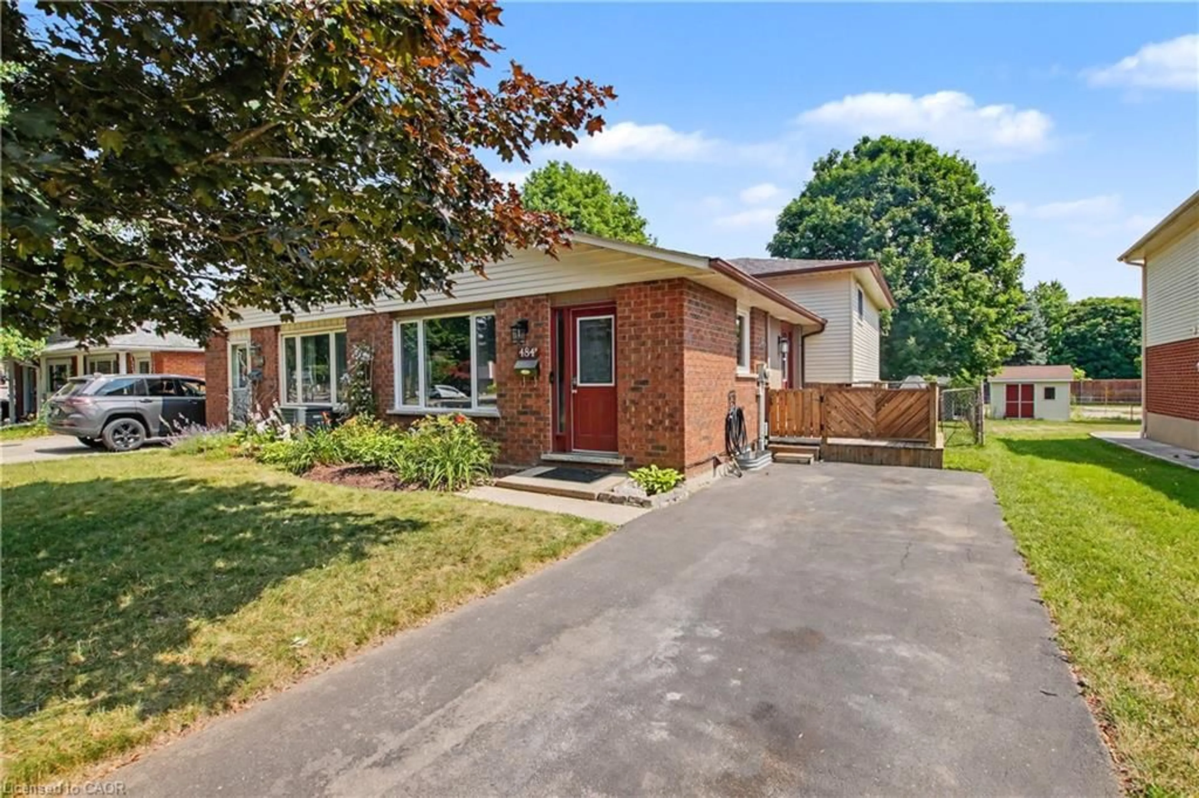 Home with brick exterior material, street for 484 Redfox Rd #B, Waterloo Ontario N2K 2V8