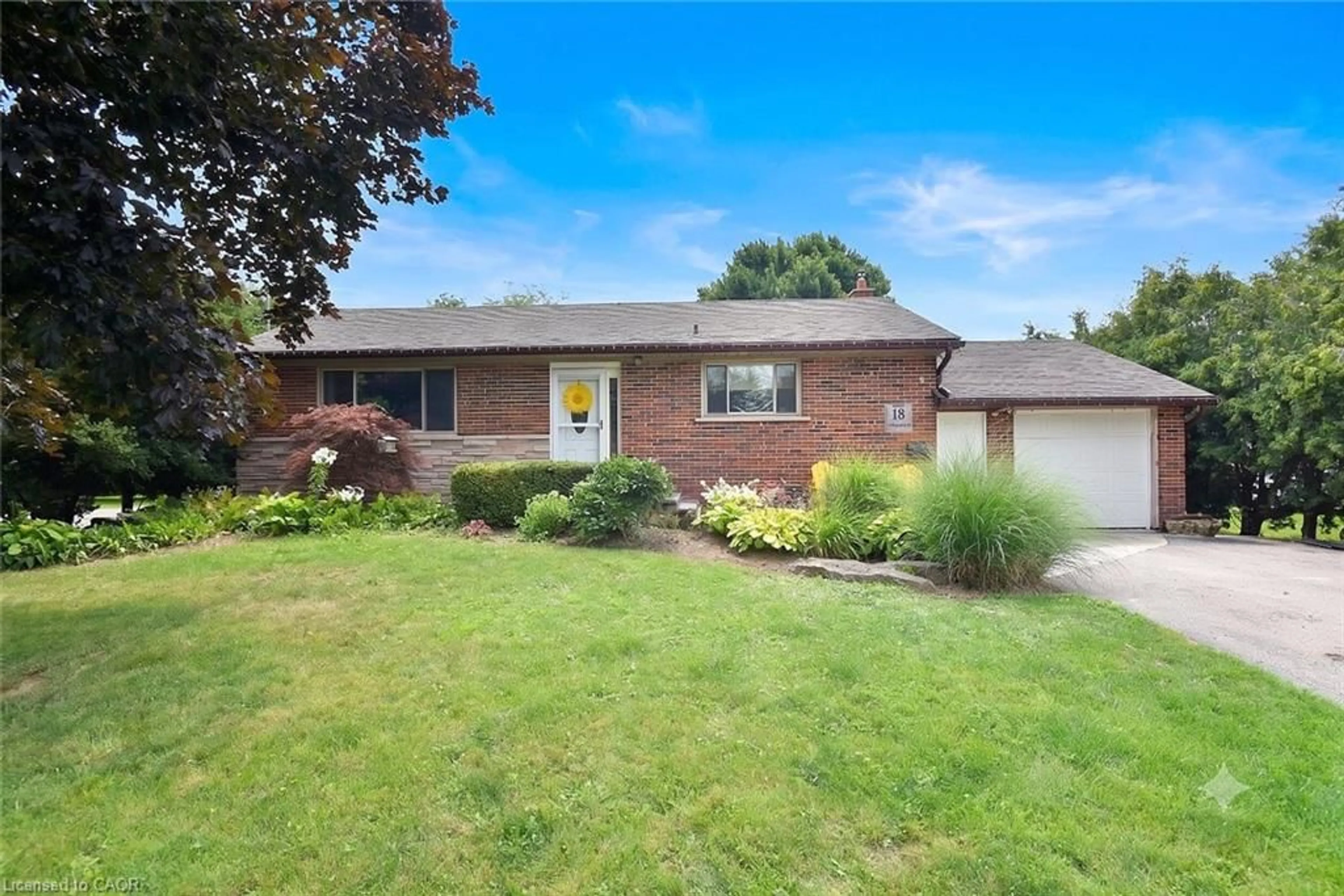 Home with brick exterior material, street for 18 Garwood Ave, Dundas Ontario L9H 7J9