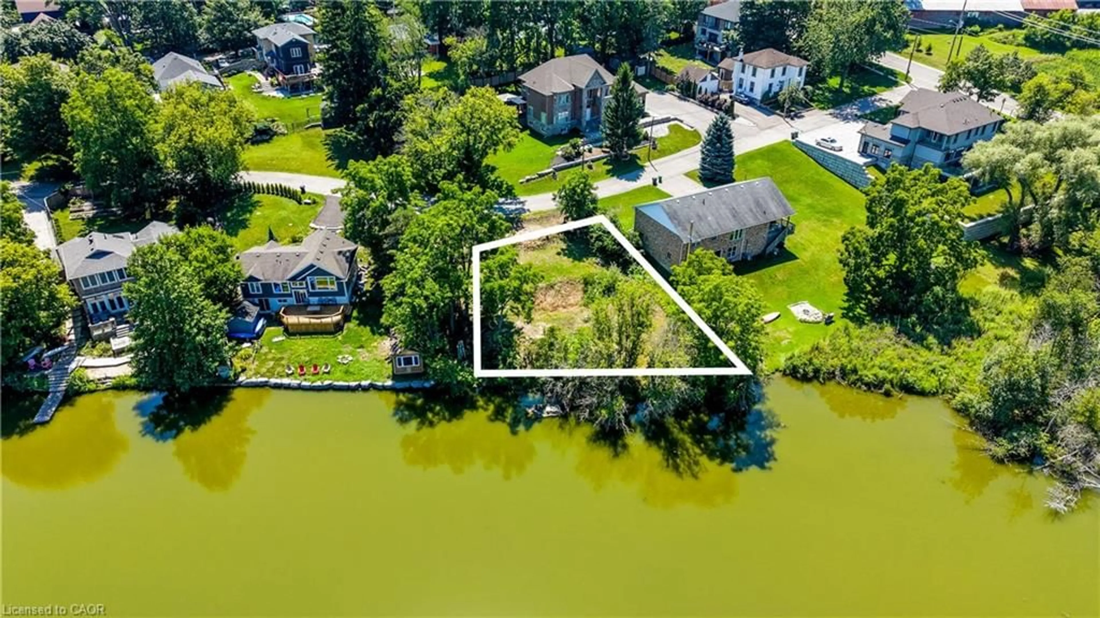 A pic from outside/outdoor area/front of a property/back of a property/a pic from drone, water/lake/river/ocean view for 62 Water St, New Dundee Ontario N0B 2E0