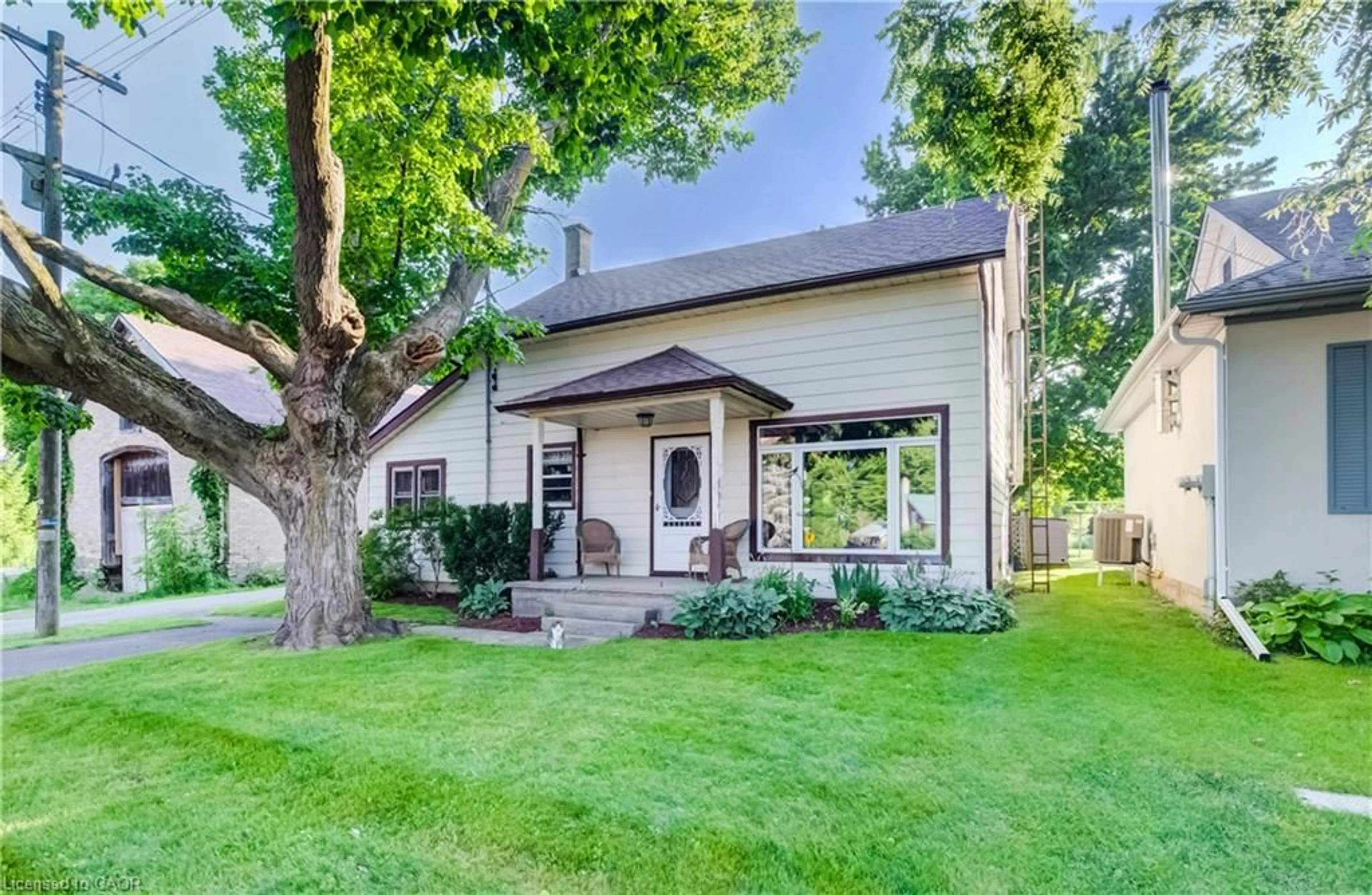Home with vinyl exterior material, street for 5199 Wilmot-Easthope Rd, Wellesley Ontario N0B 2T0
