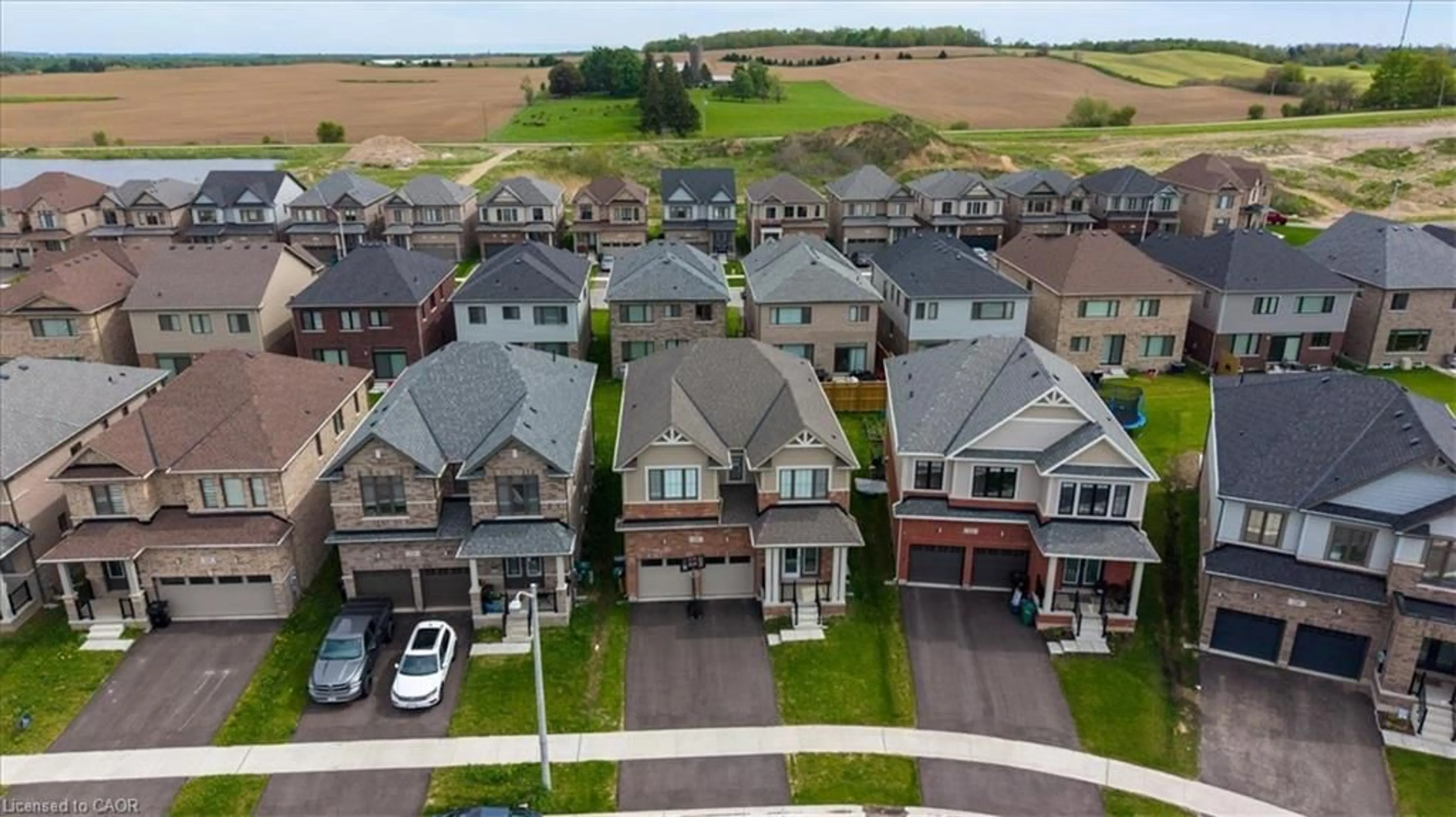 A pic from outside/outdoor area/front of a property/back of a property/a pic from drone, street for 18 John Carpenter Rd, Ayr Ontario N0B 1E0