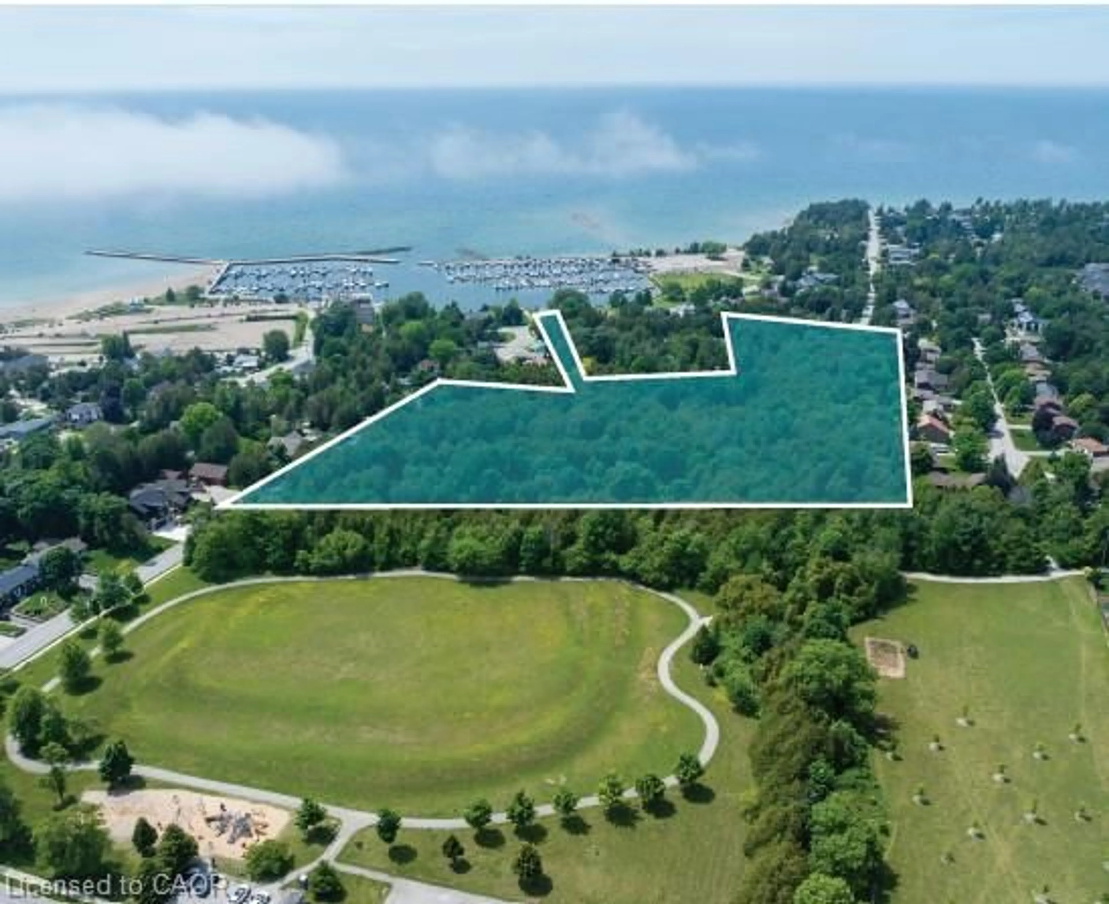 A pic from outside/outdoor area/front of a property/back of a property/a pic from drone, water/lake/river/ocean view for 15 Market St, Port Elgin Ontario N0H 2C6