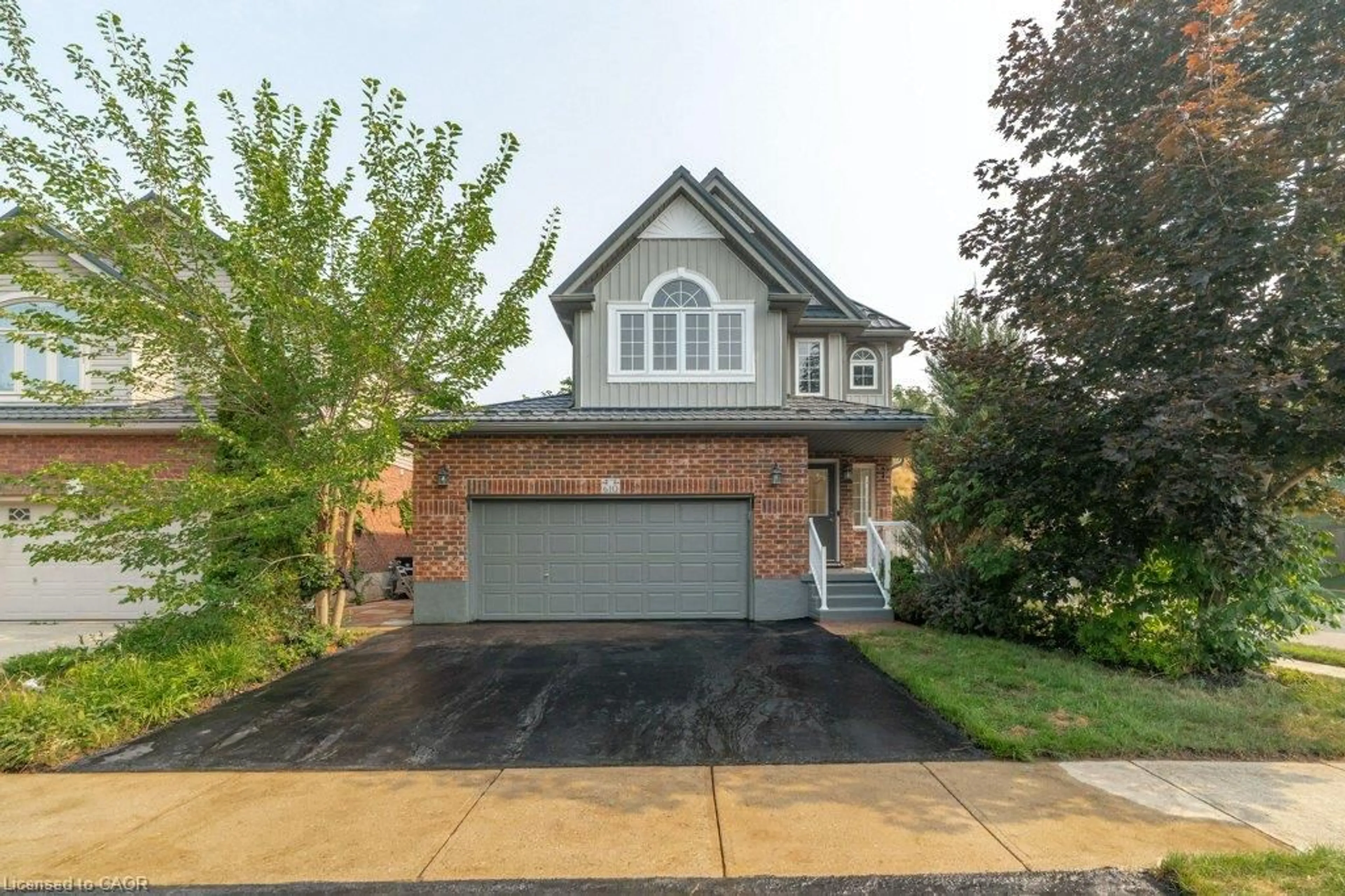 Home with brick exterior material, street for 610 Violet St, Waterloo Ontario N2V 2V9