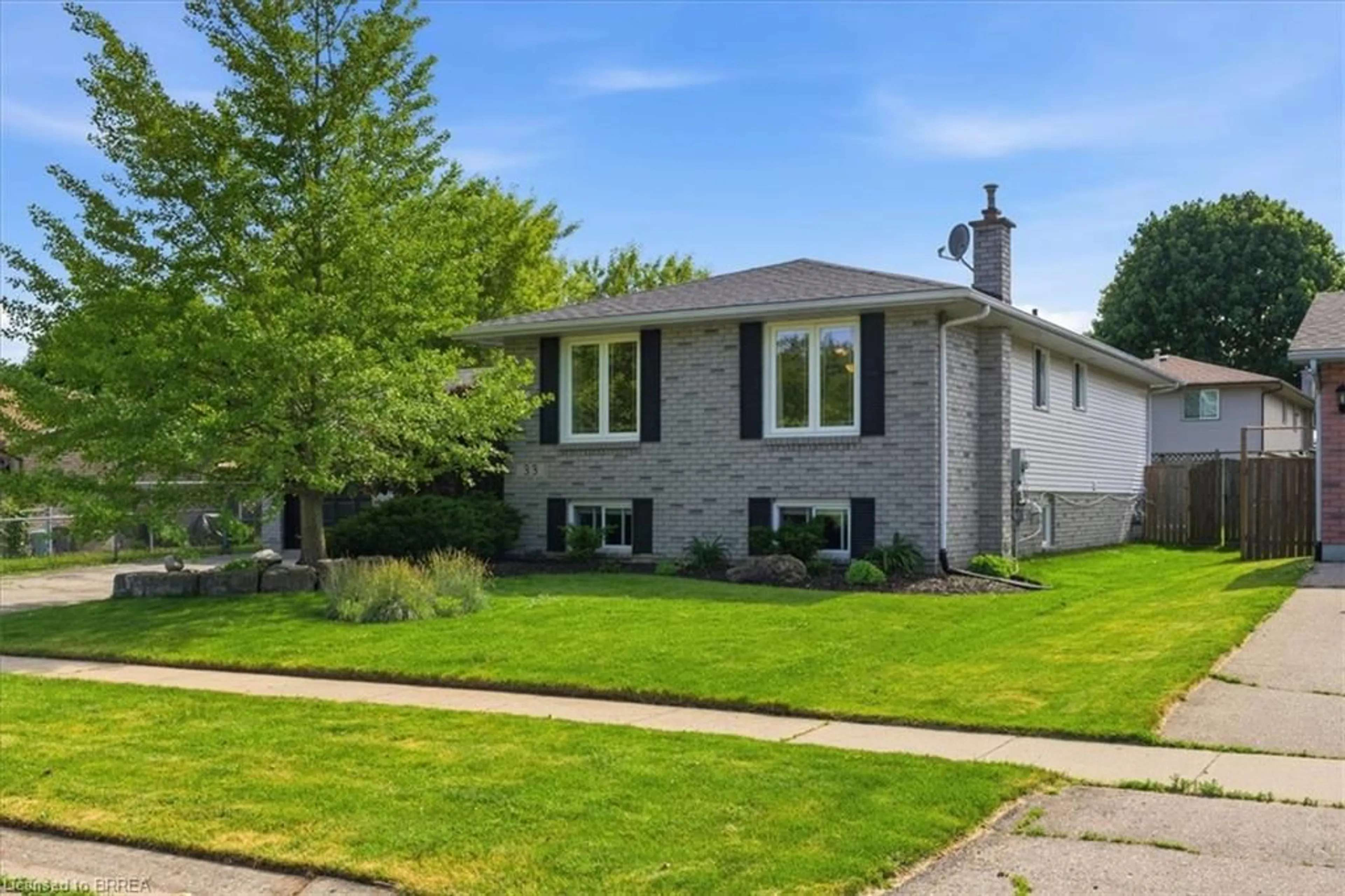 Home with brick exterior material, street for 33 Edward Ave, St. George Ontario N0E 1N0