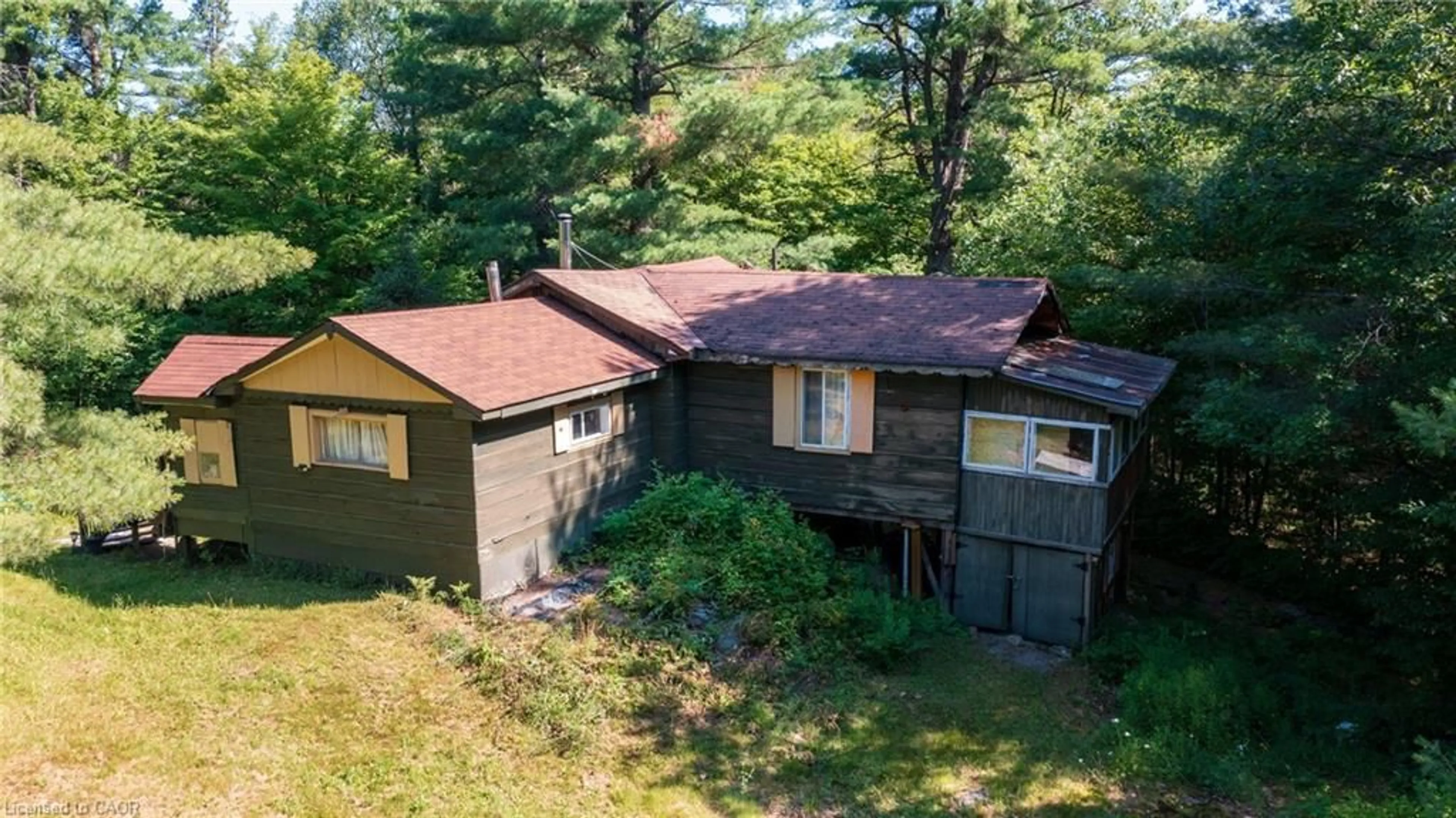 A pic from outside/outdoor area/front of a property/back of a property/a pic from drone, unknown for 3726 Nipissing Rd, Magnetawan Ontario P0A 1P0