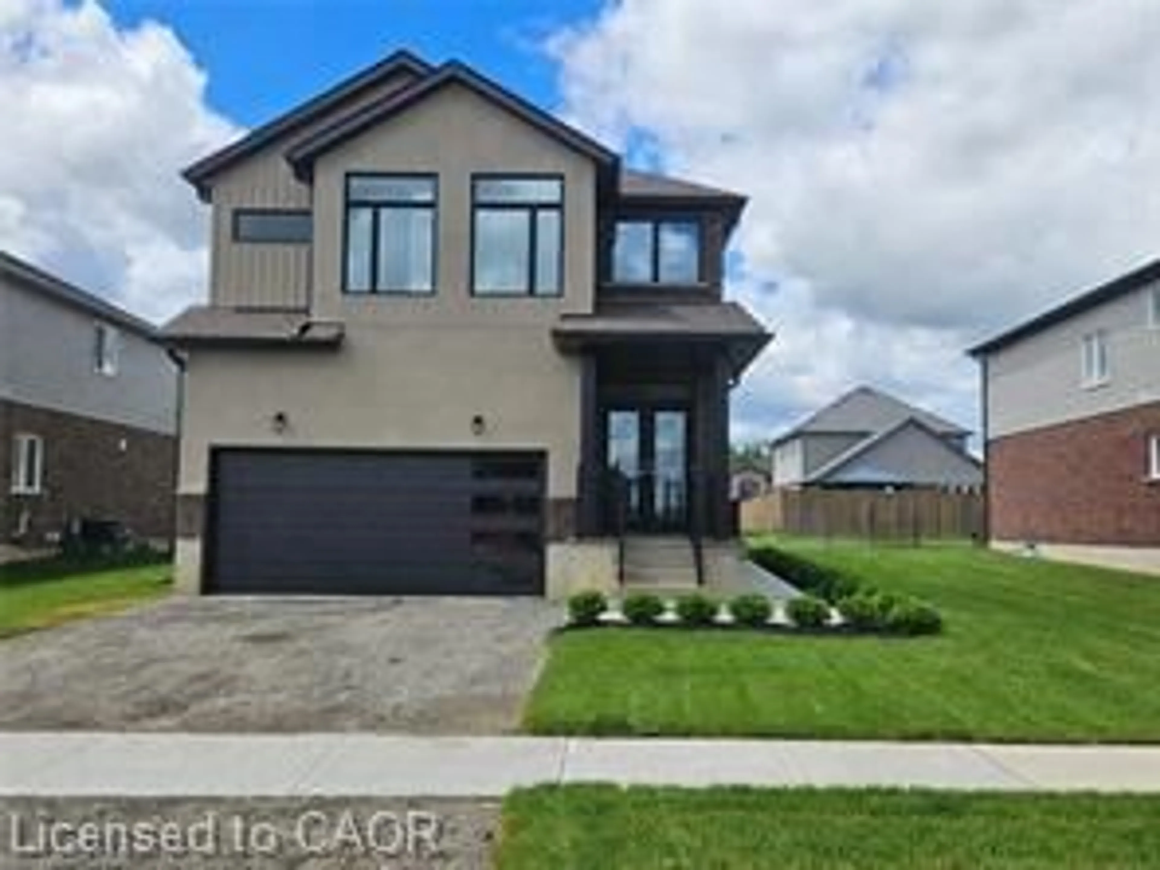 Home with brick exterior material, street for 123 Maple St, Drayton Ontario N0G 1P0